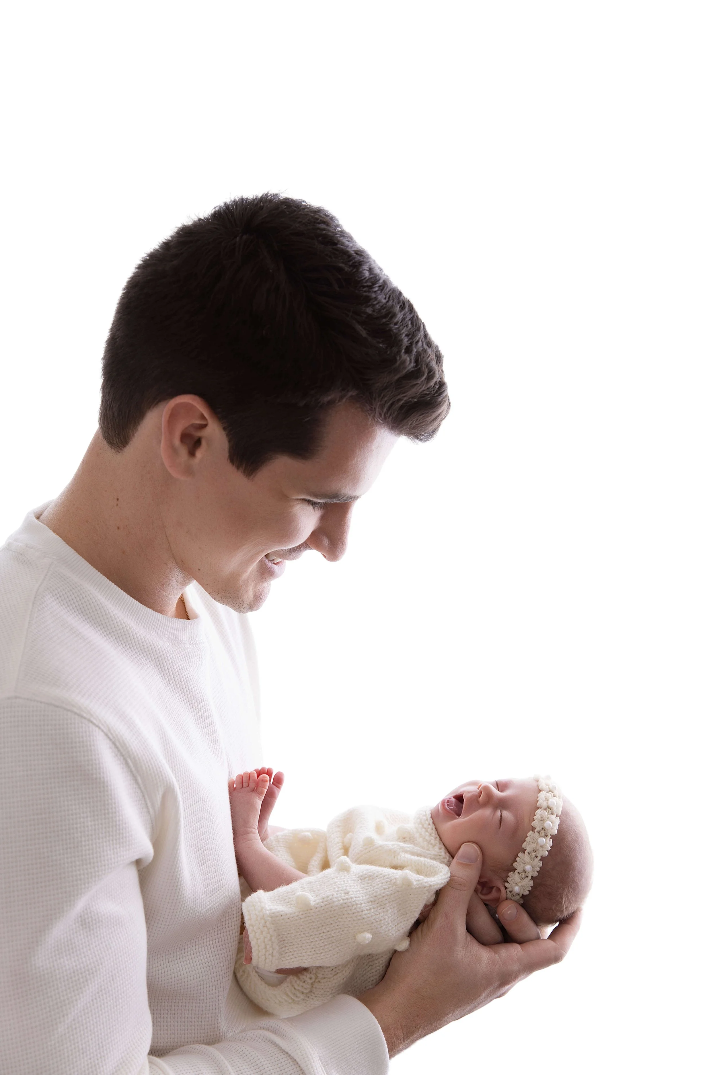 Father looking at his baby girl