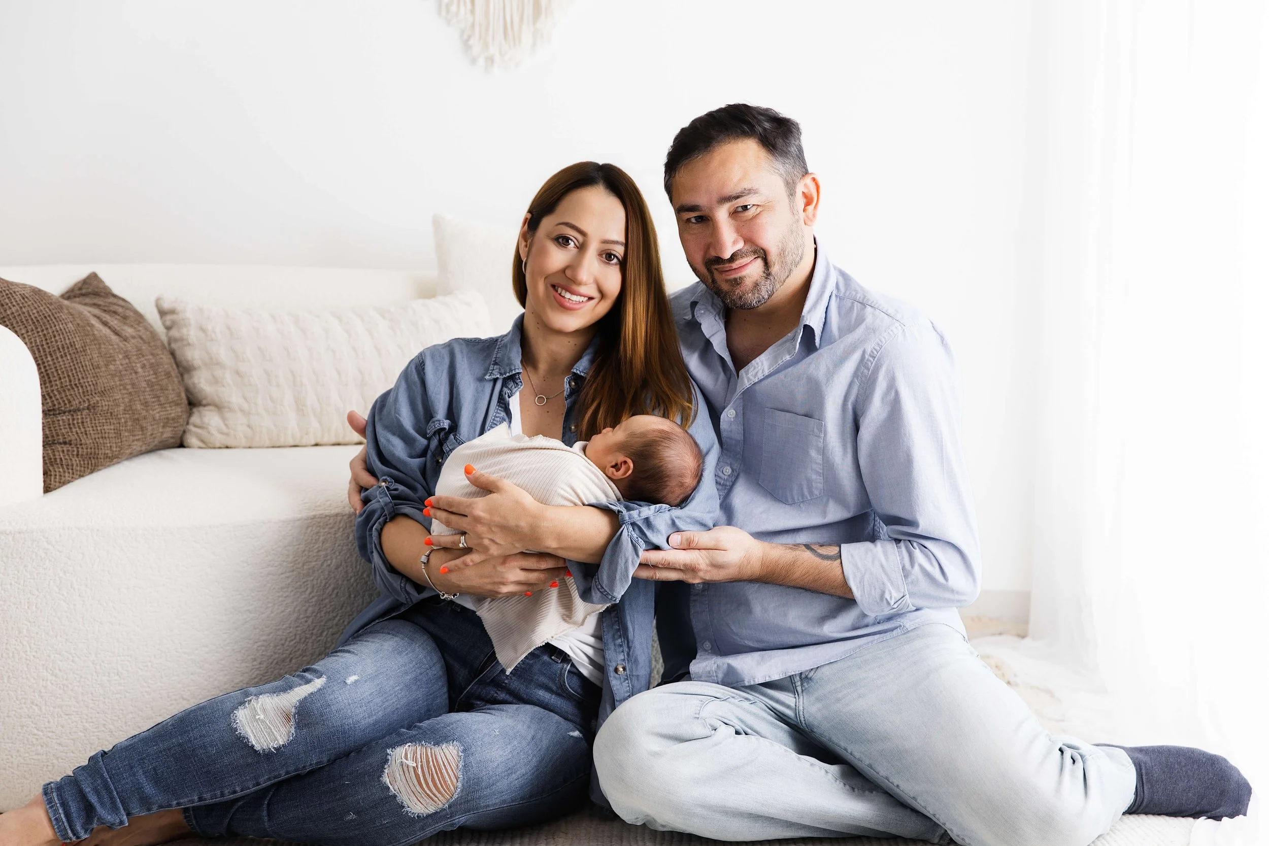 parents holding newborn boy