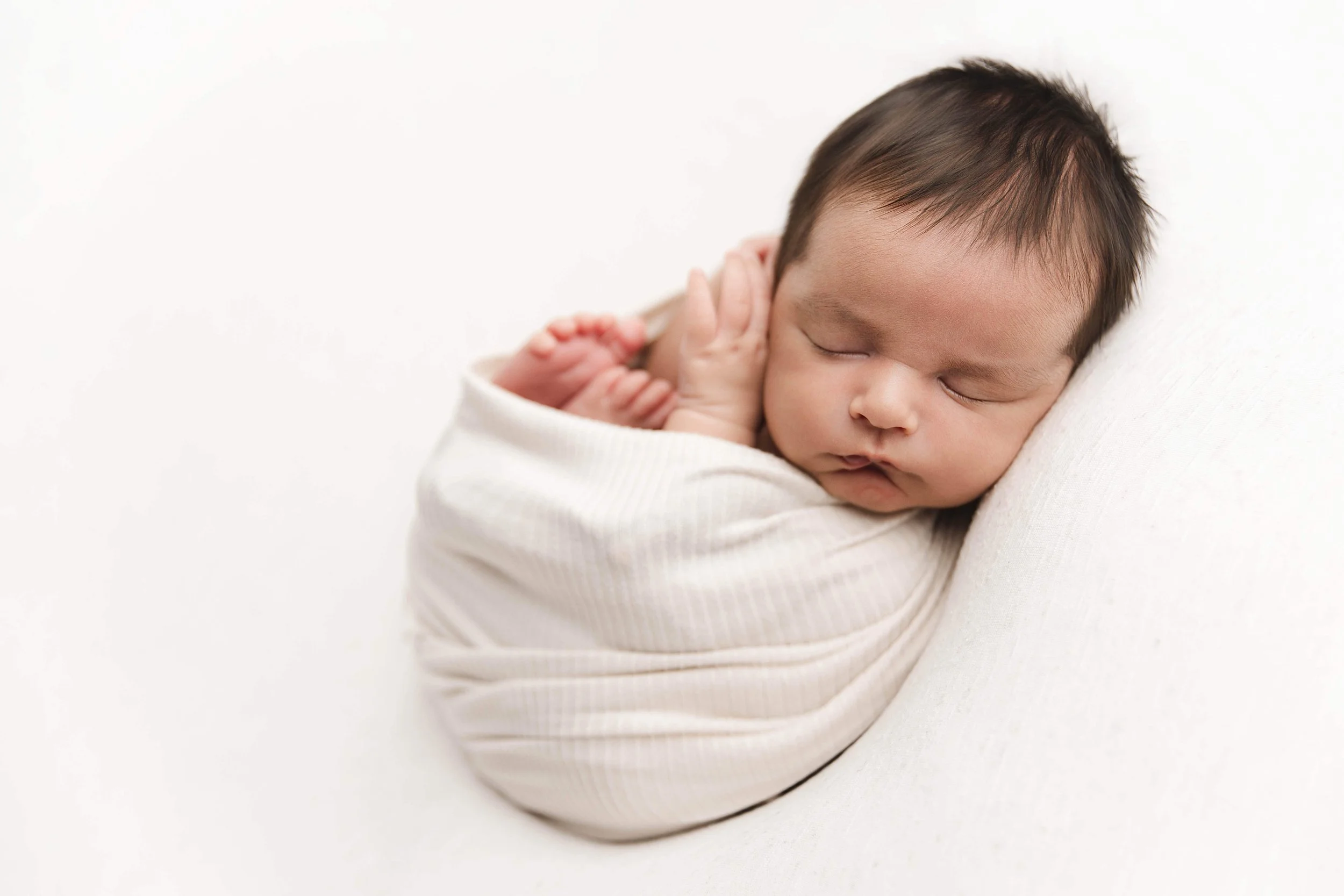 baby boy in beige