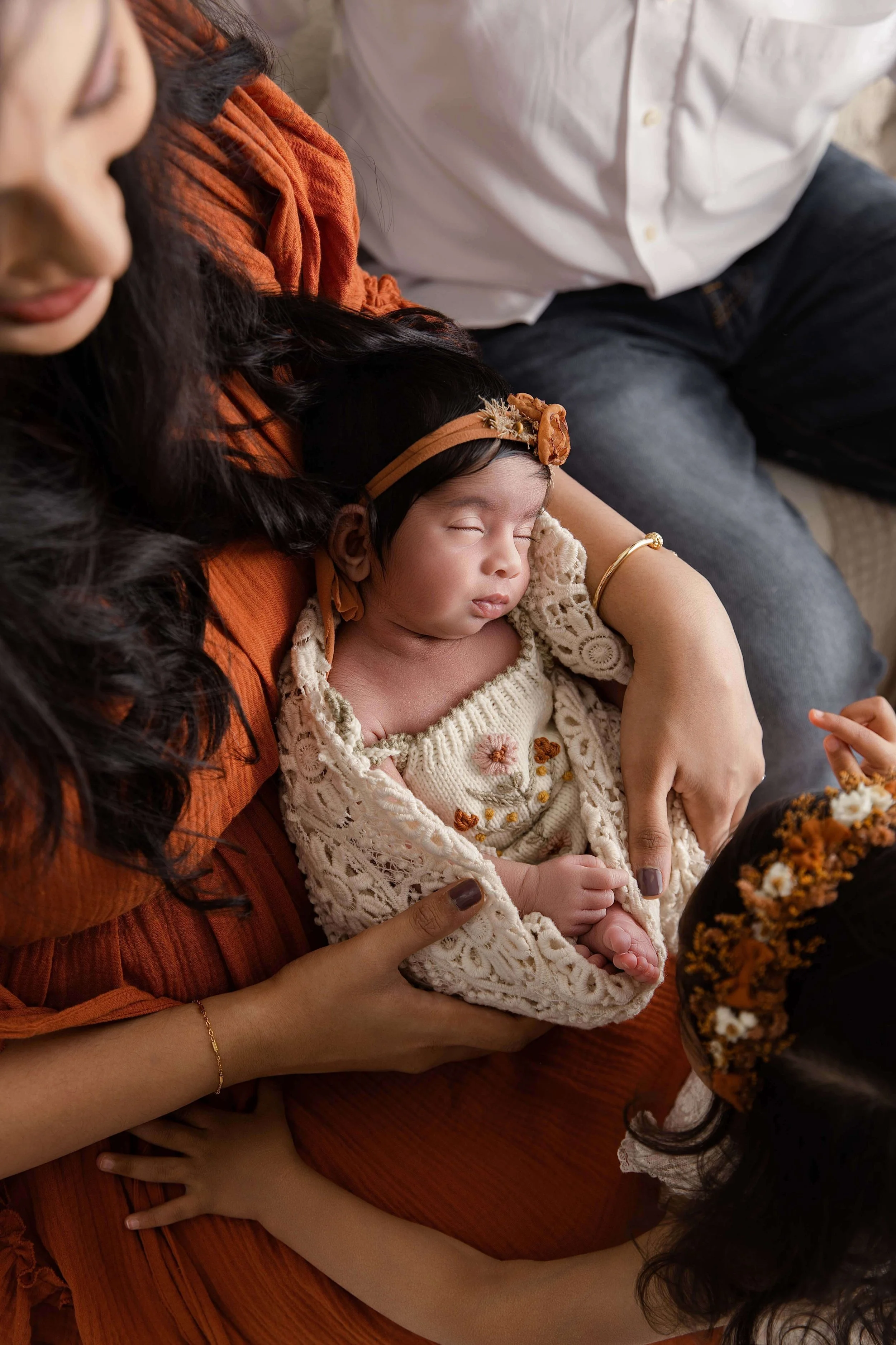 Candid newborn and family