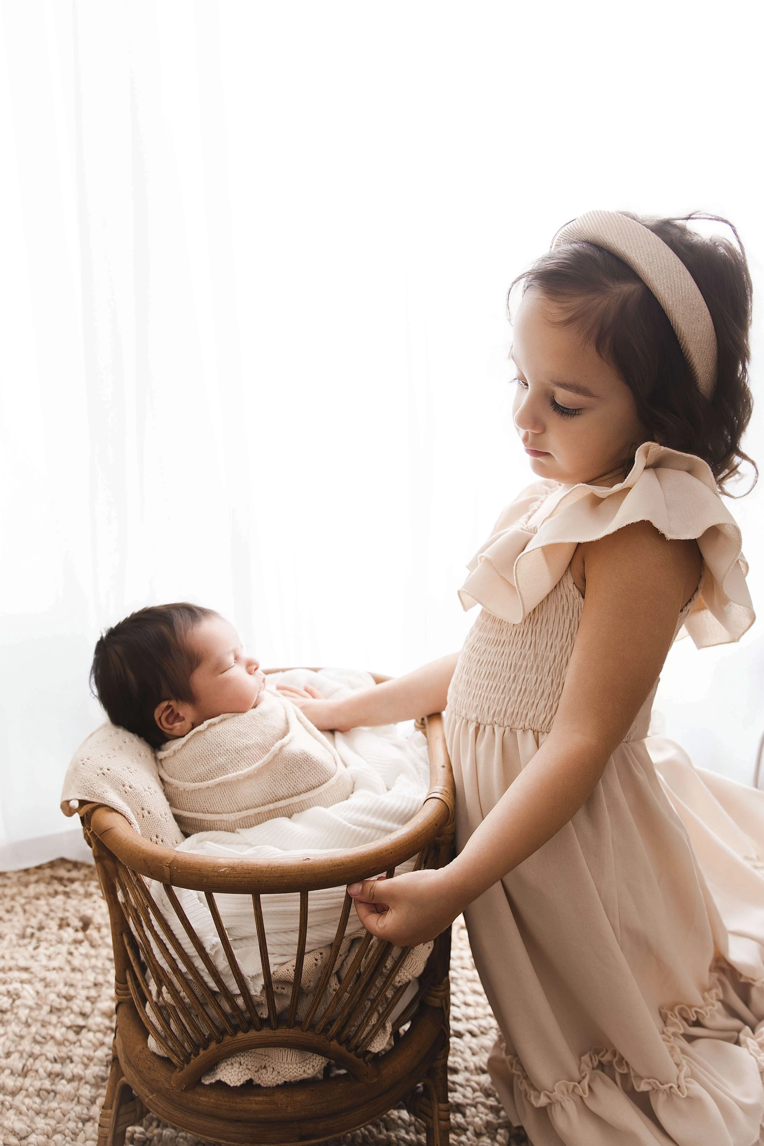 backlit image with sister and baby brother rustic