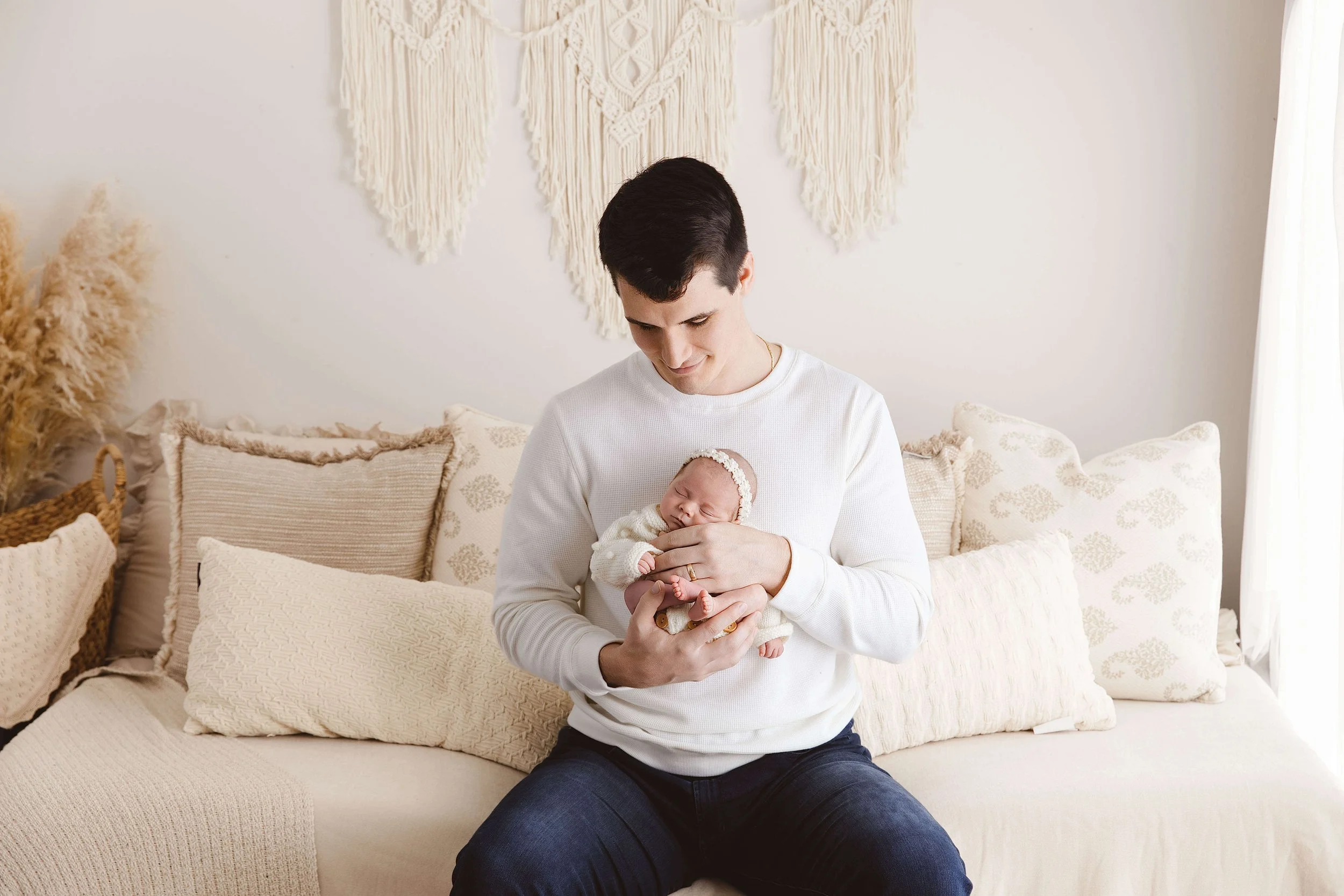 Father cuddling with his baby girl
