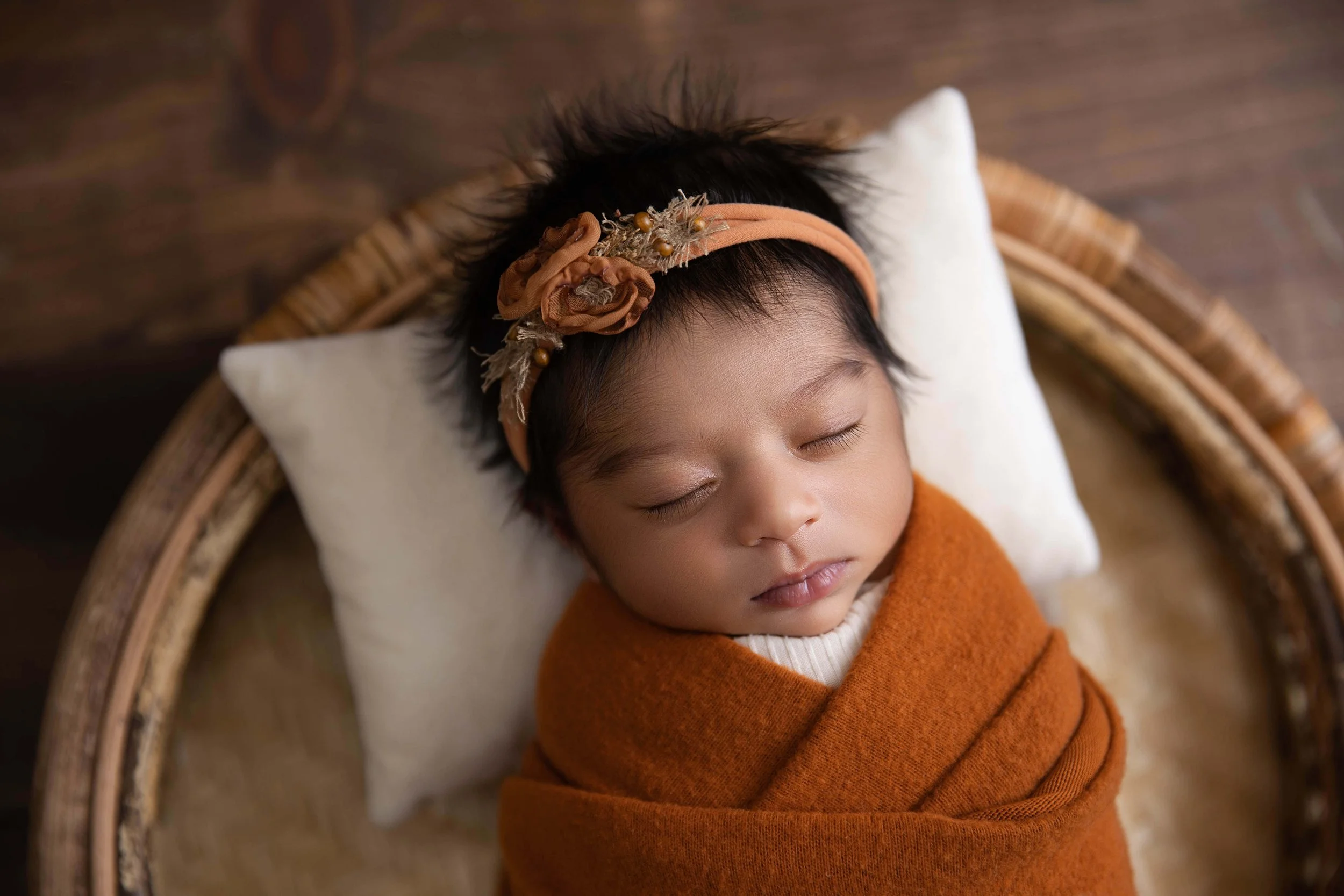 Luxury newborn photography session in Frisco Texas featuring timeless baby and family moments