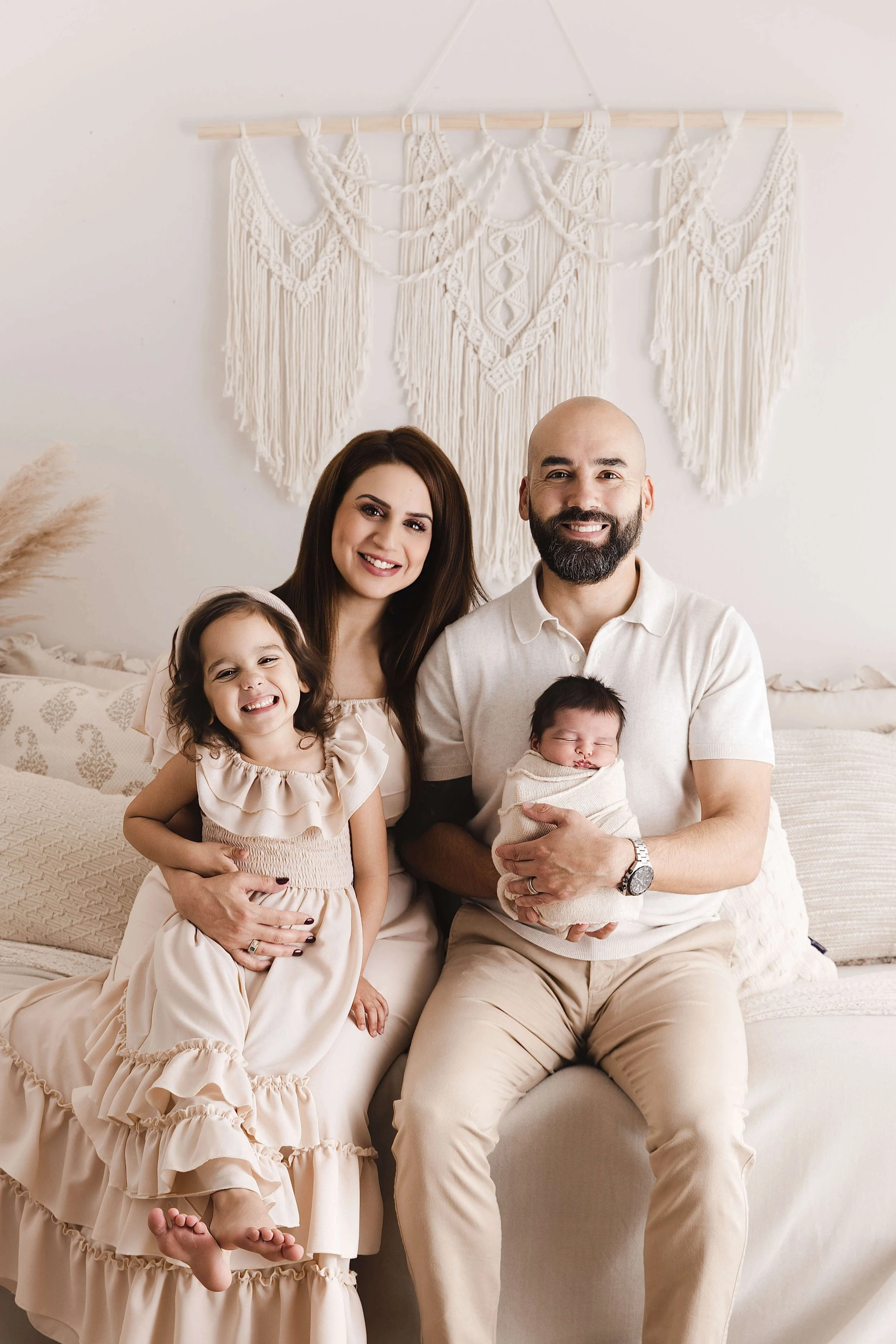 parents and baby boy and older sister