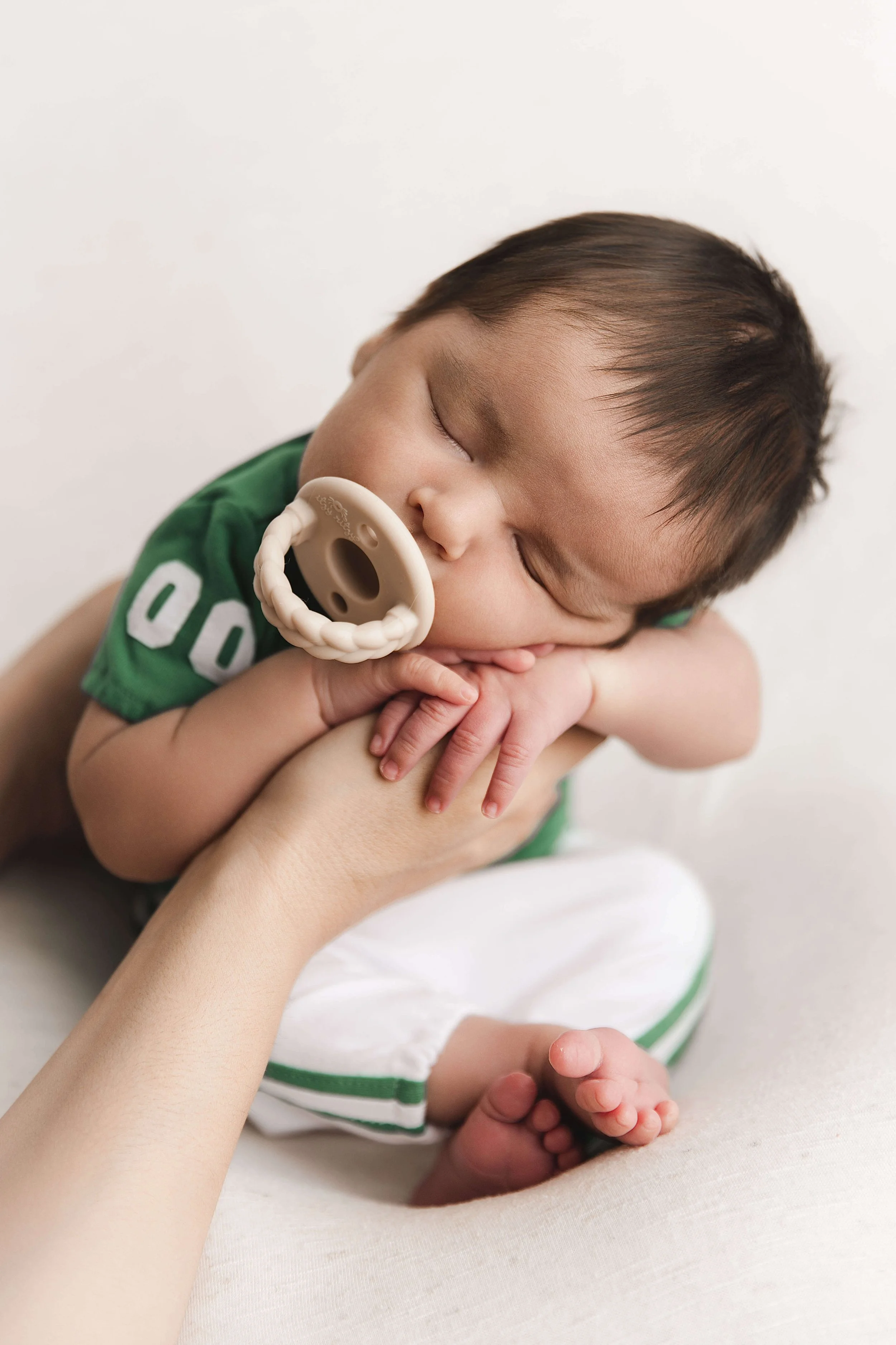 Baby boy with pacifier