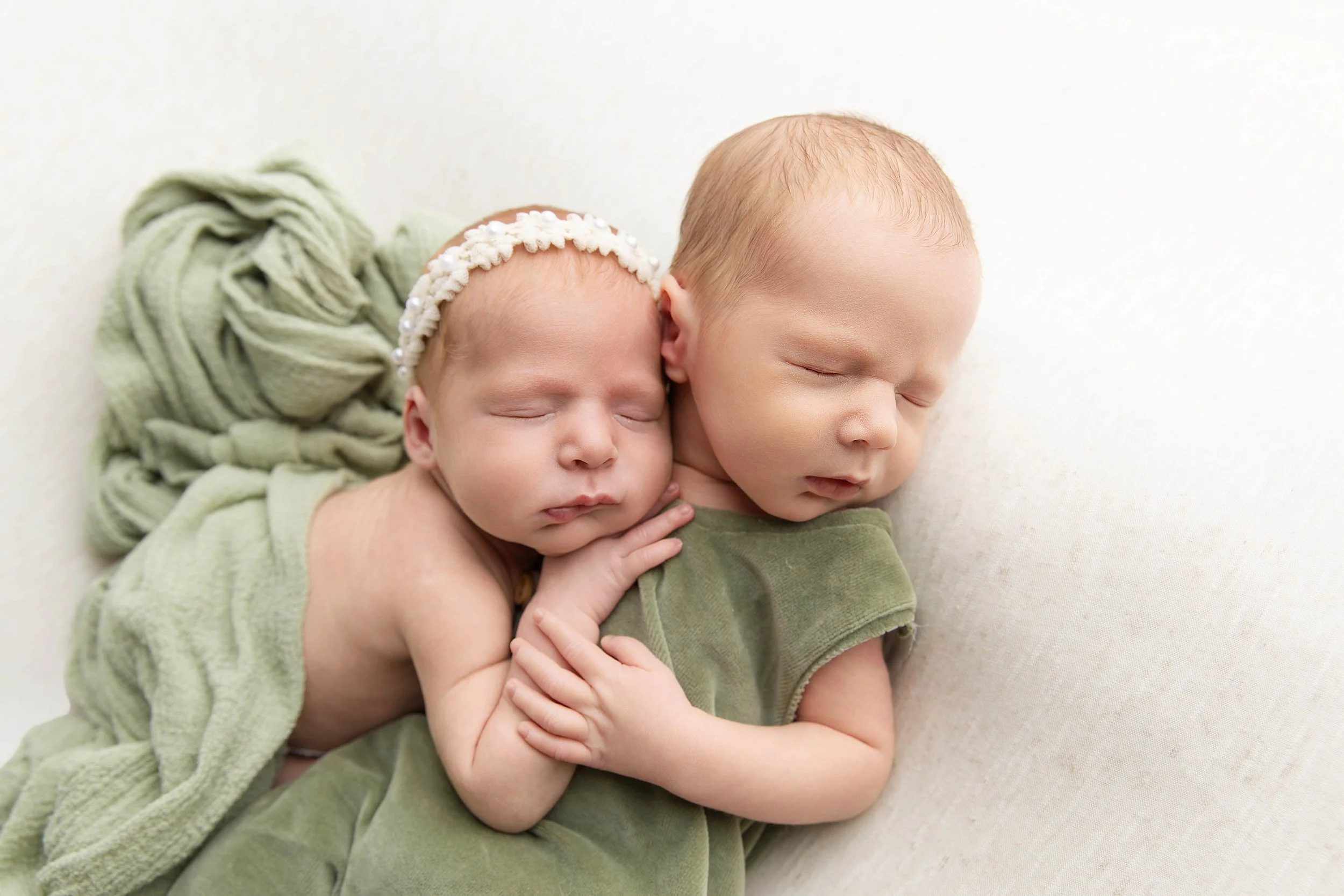twin babies in sage green
