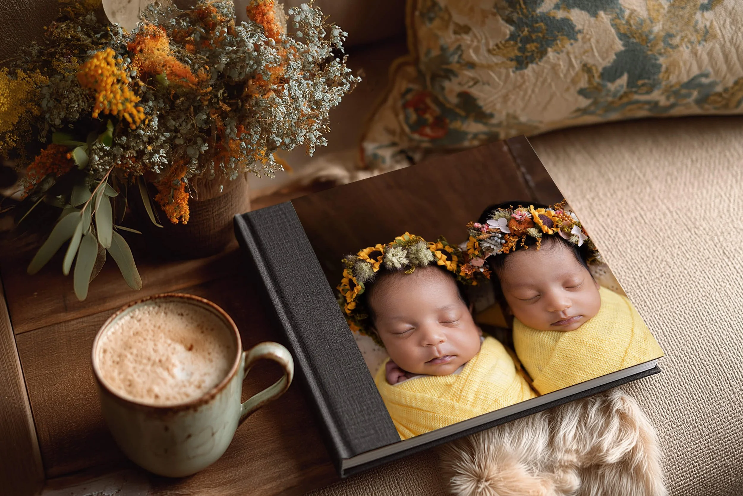 Luxury newborn photography album featuring twin baby portraits photographed by a Frisco TX newborn photographer