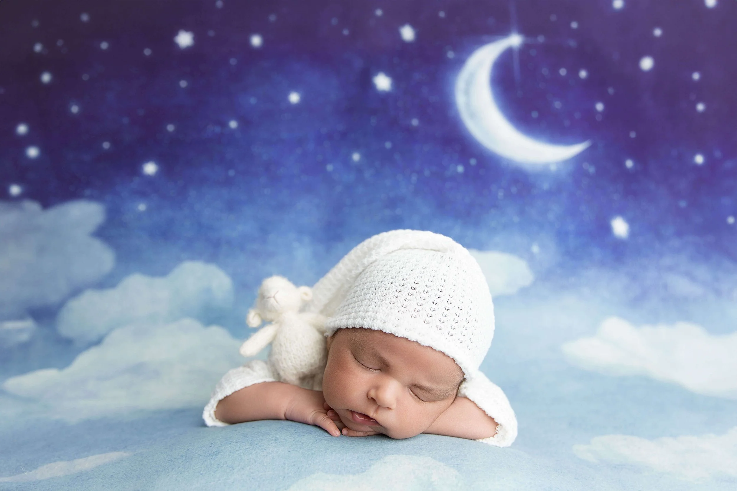 Baby boy with blue sky background