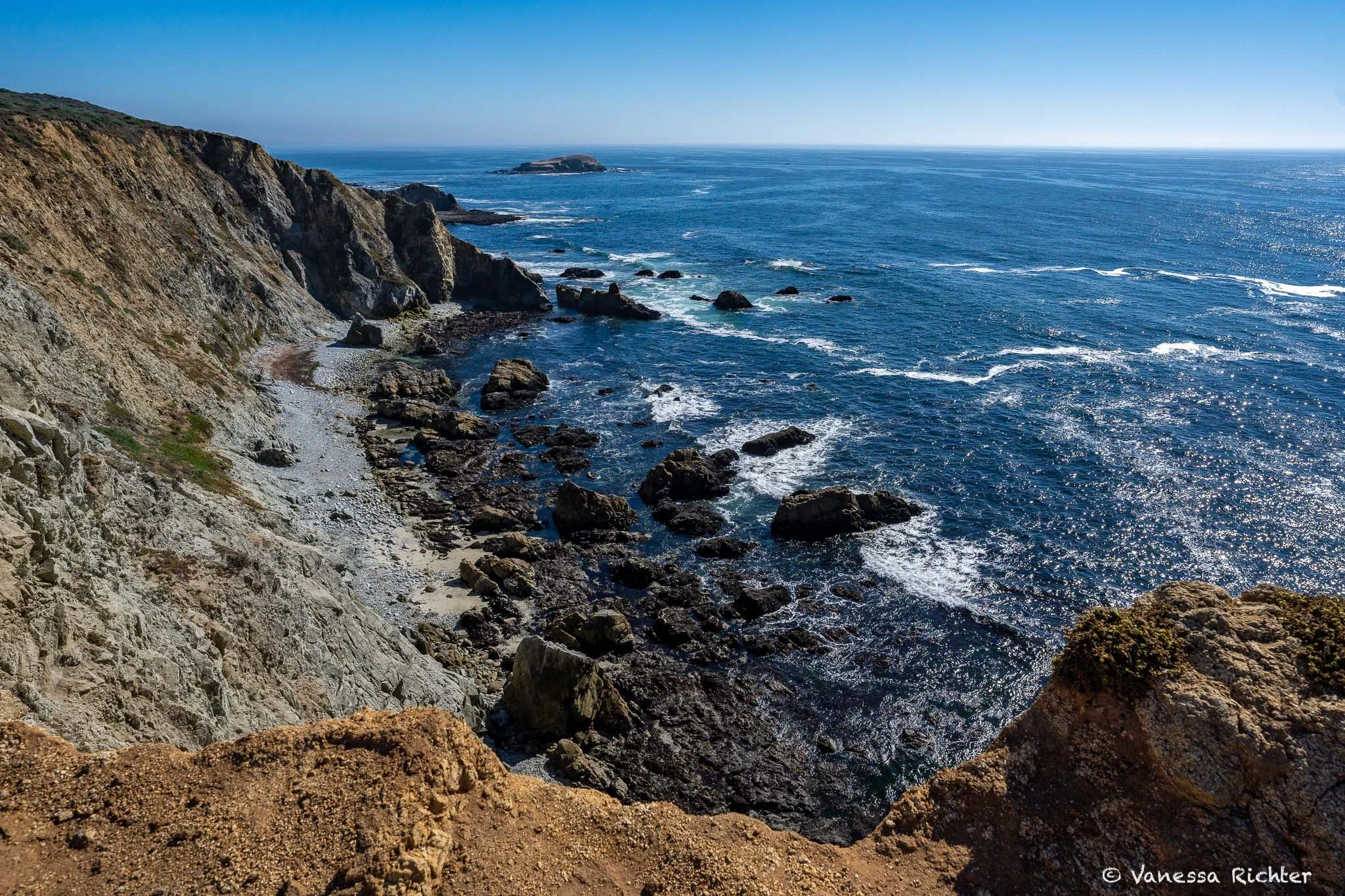 Rugged shoreline and deep blue ocean at Point Reyes National Seashore