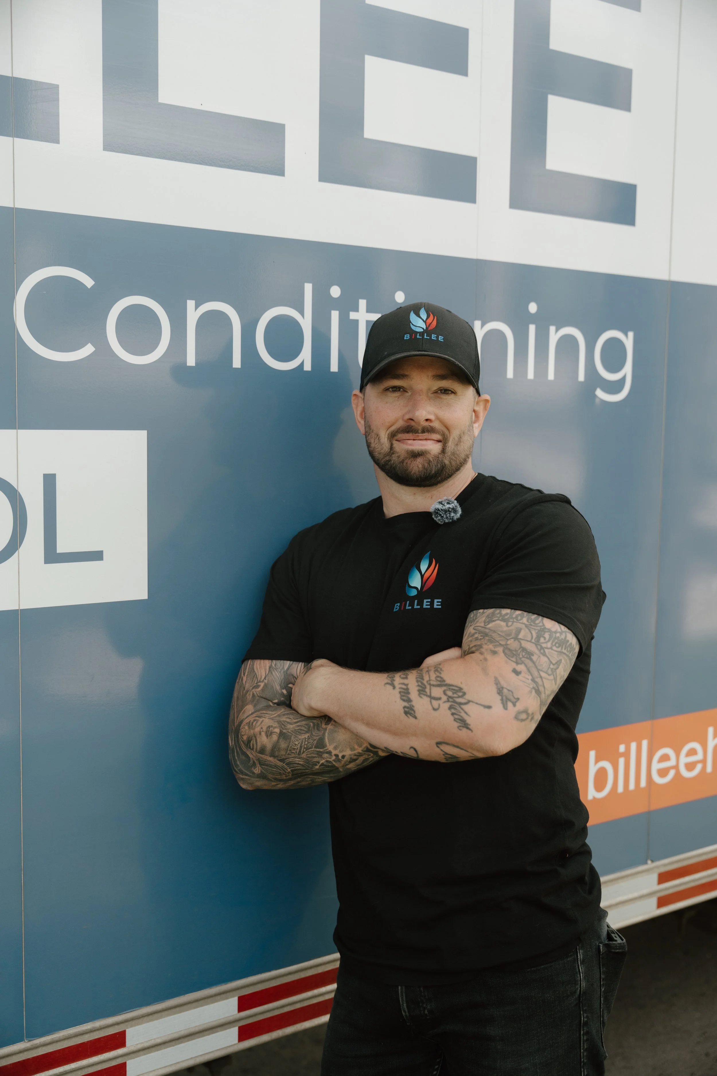 Edmonton heating and cooling experts BILLEE Heating & Air Conditioning are photographed on-site helping their customers in Edmonton