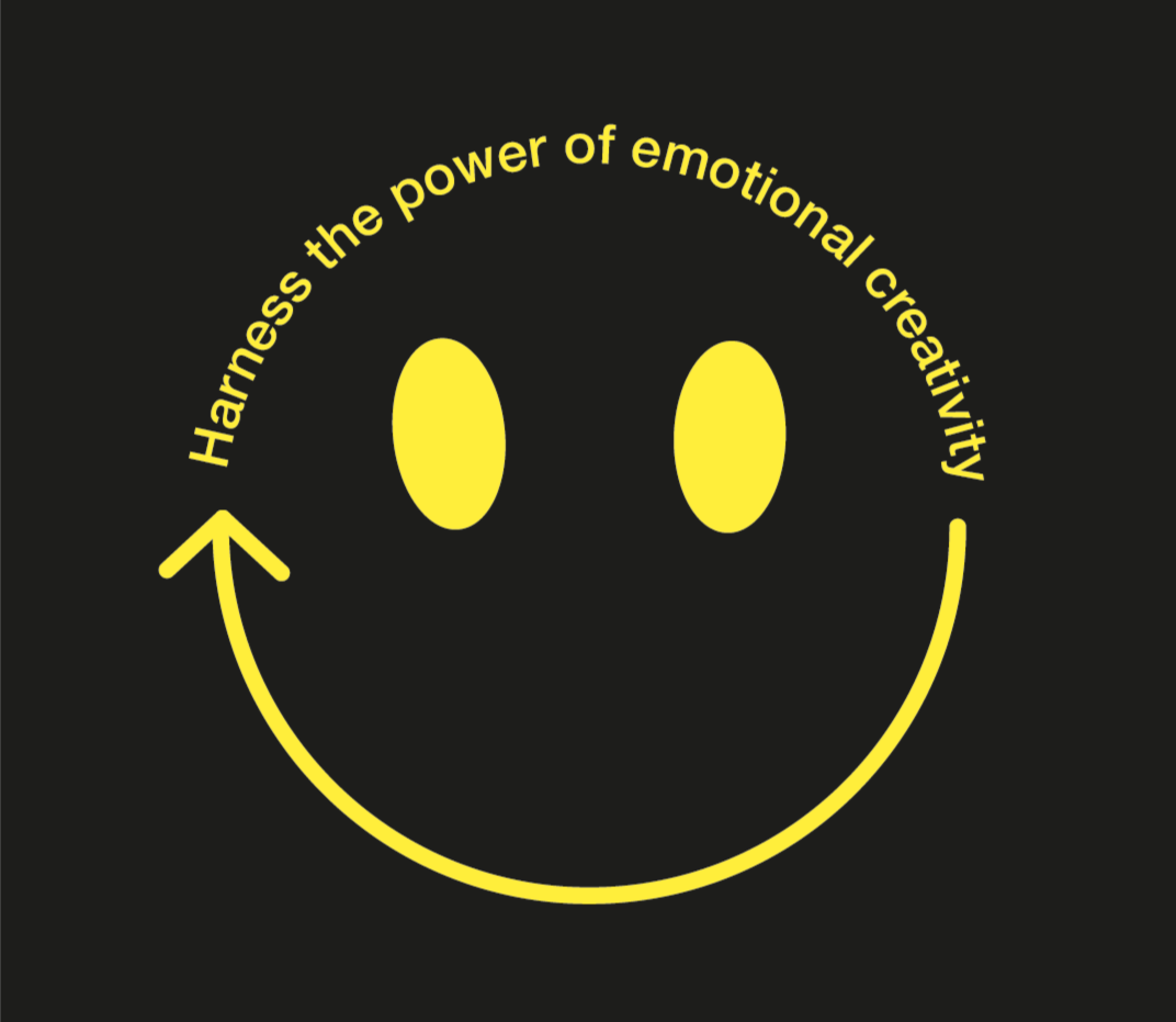 A yellow smiley face with oval eyes and a curved line for a mouth on a black background. The phrase 'Harness the power of emotional creativity' curves along the upper part of the smiley face.