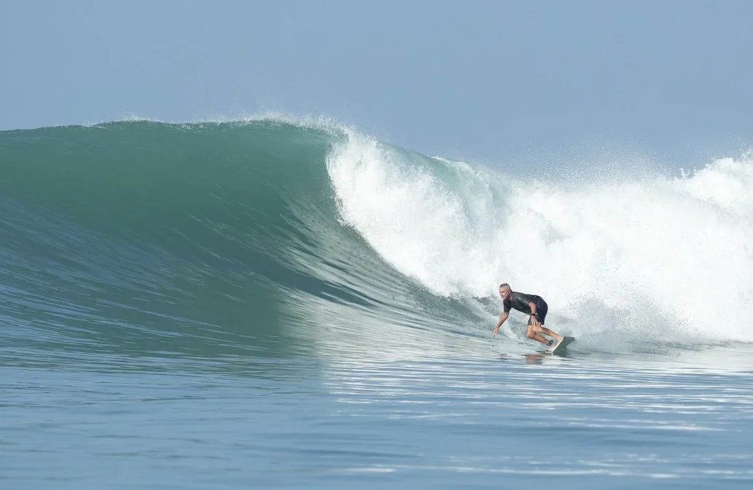 Chris Prewitt surfing in Indonesia