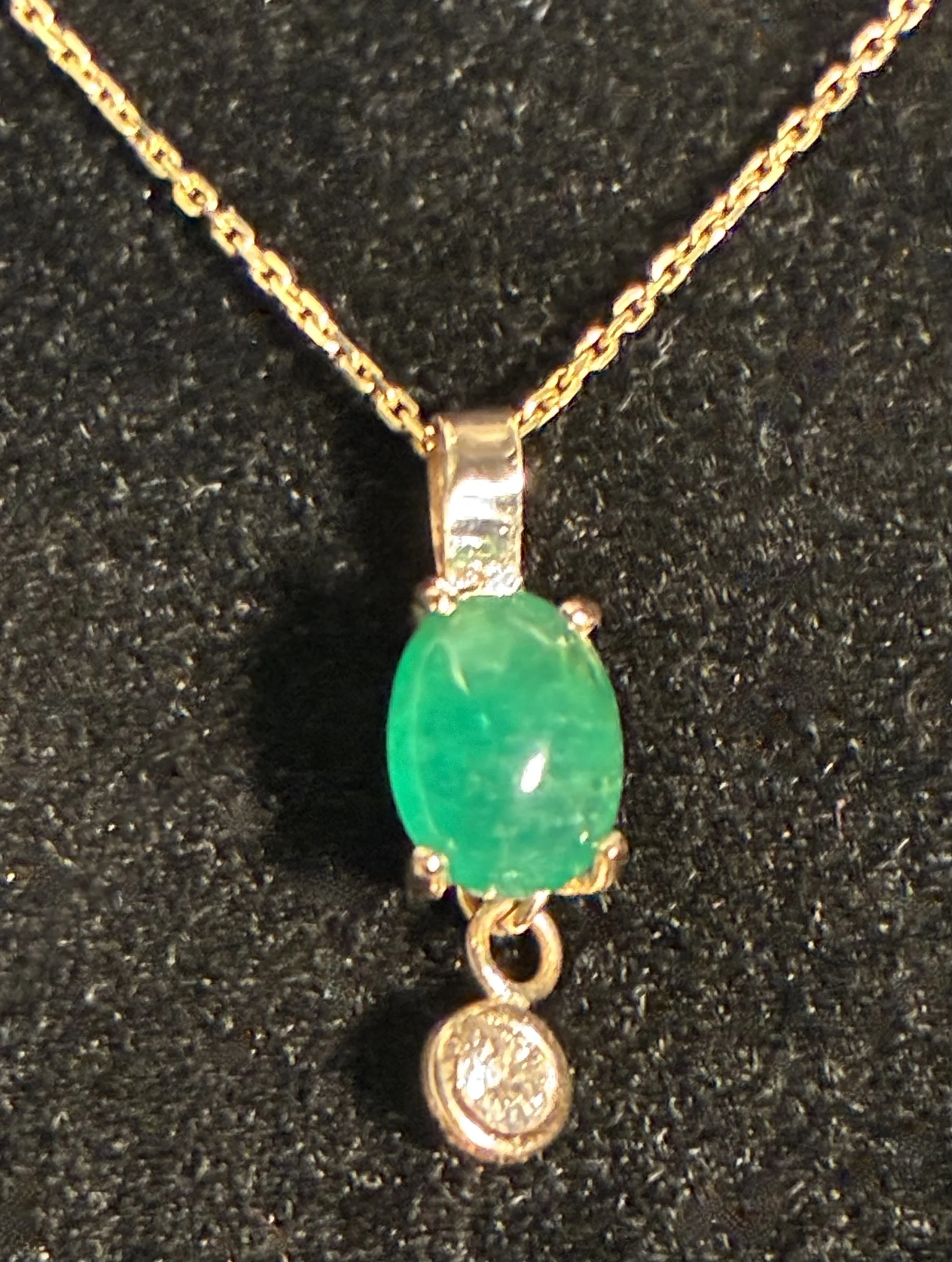 (62) 9ct gold with Emerald and Diamond Pendant