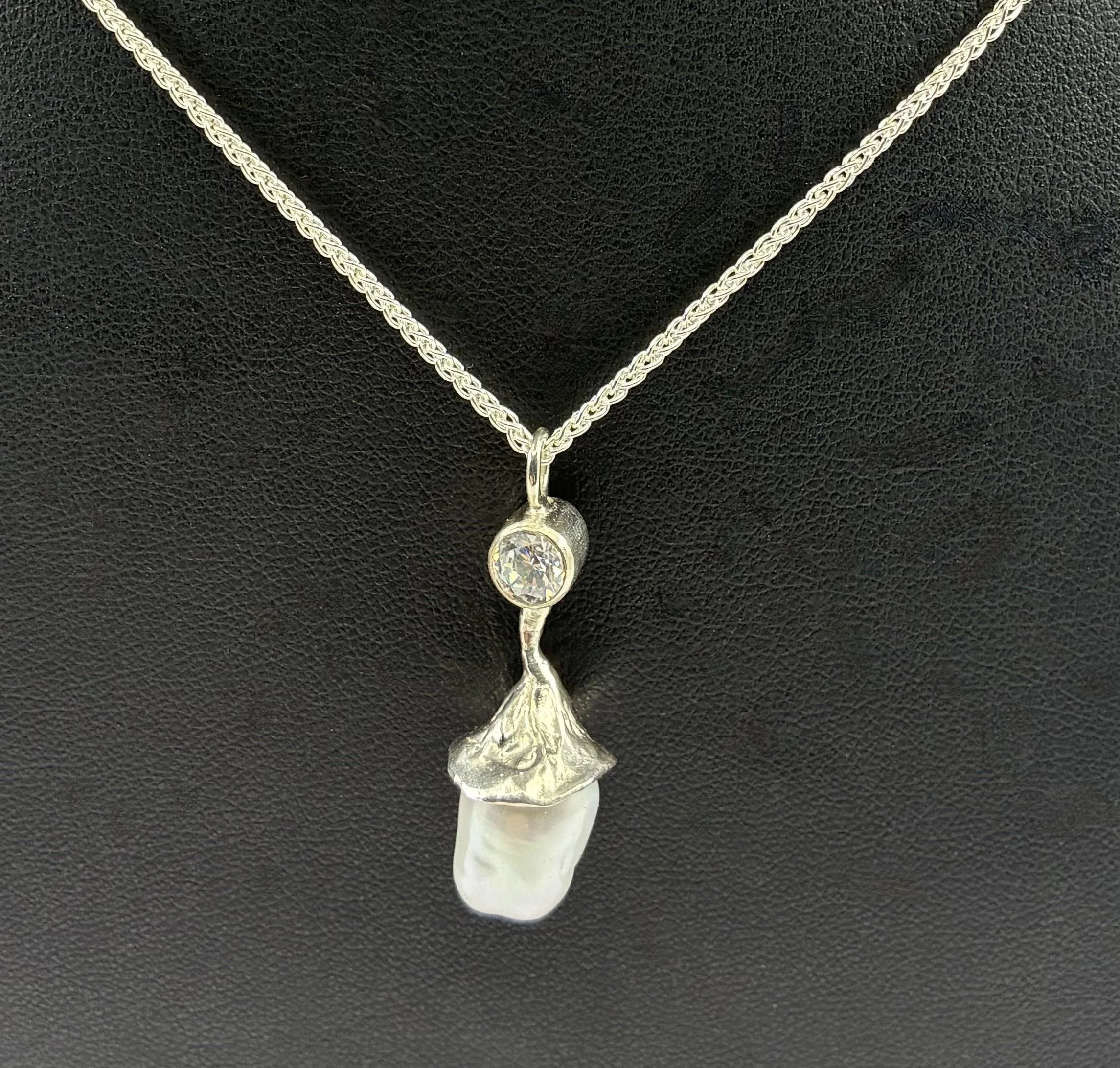 (1) Sterling Silver and Pearl and Diamond Pendant