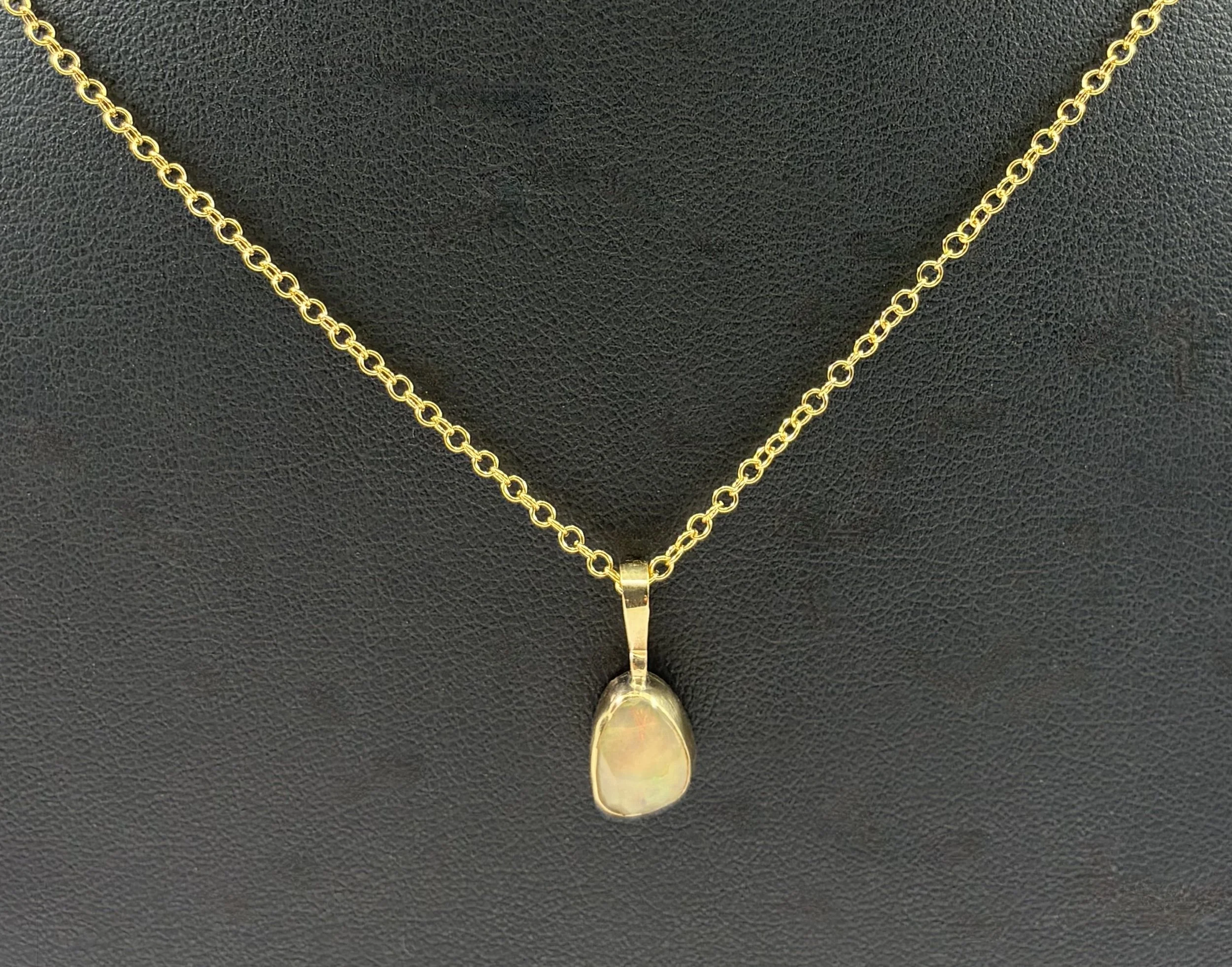 (50) 9ct Gold and Opal Pendant