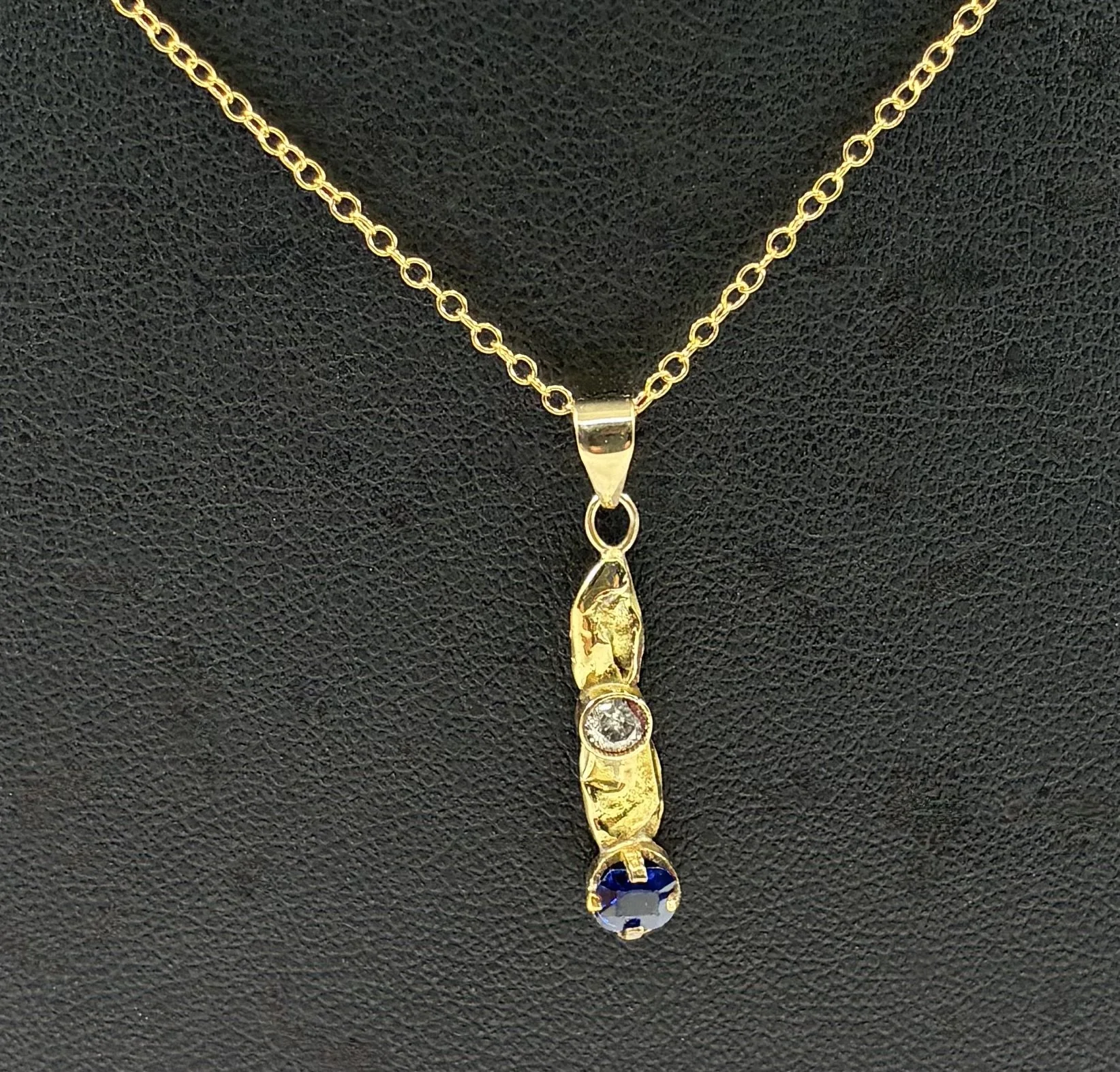 (47) 9ct Gold and Tanzanite and Diamond Pendant