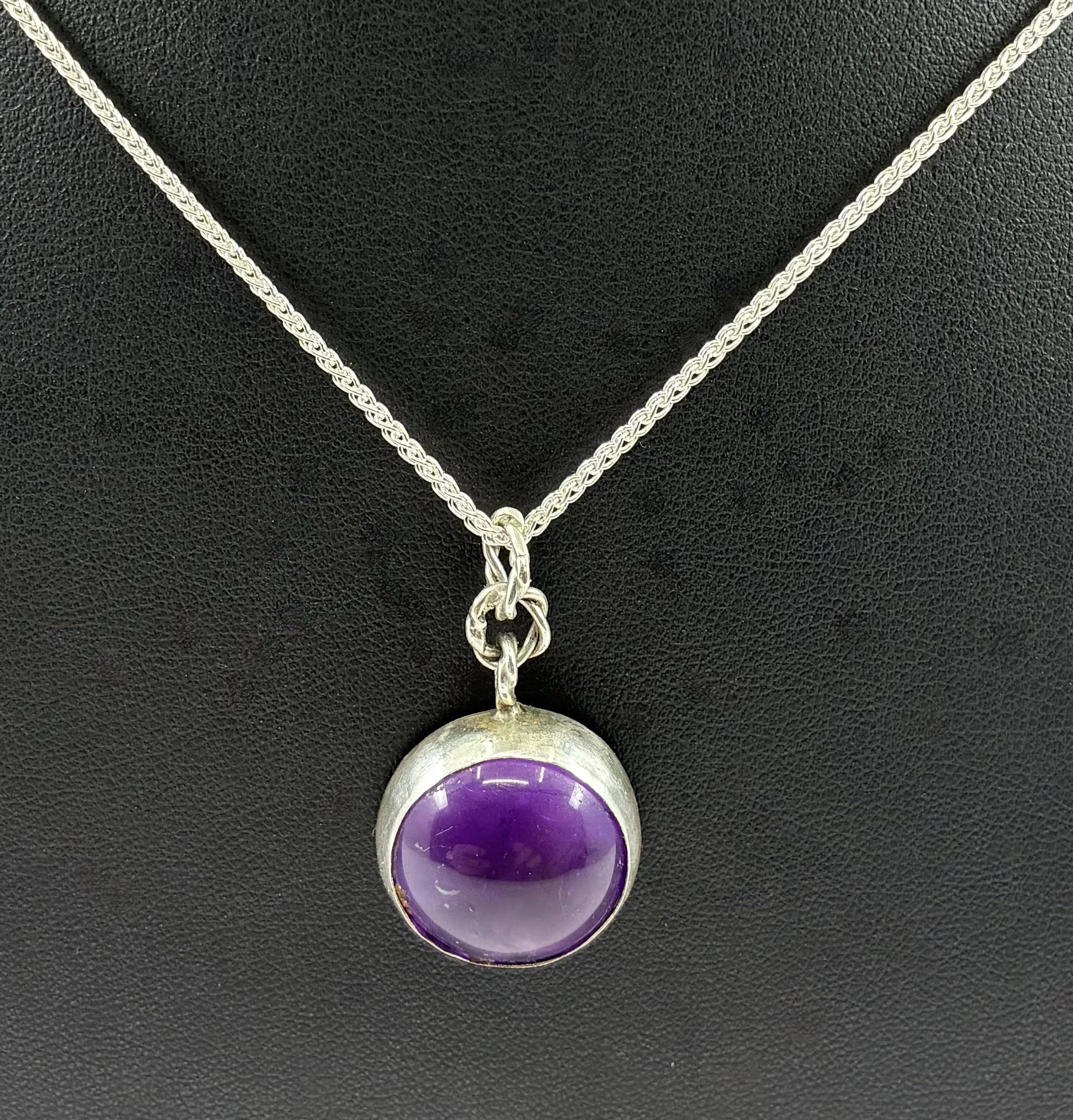 (30) Sterling silver and  Amethyst Pendant