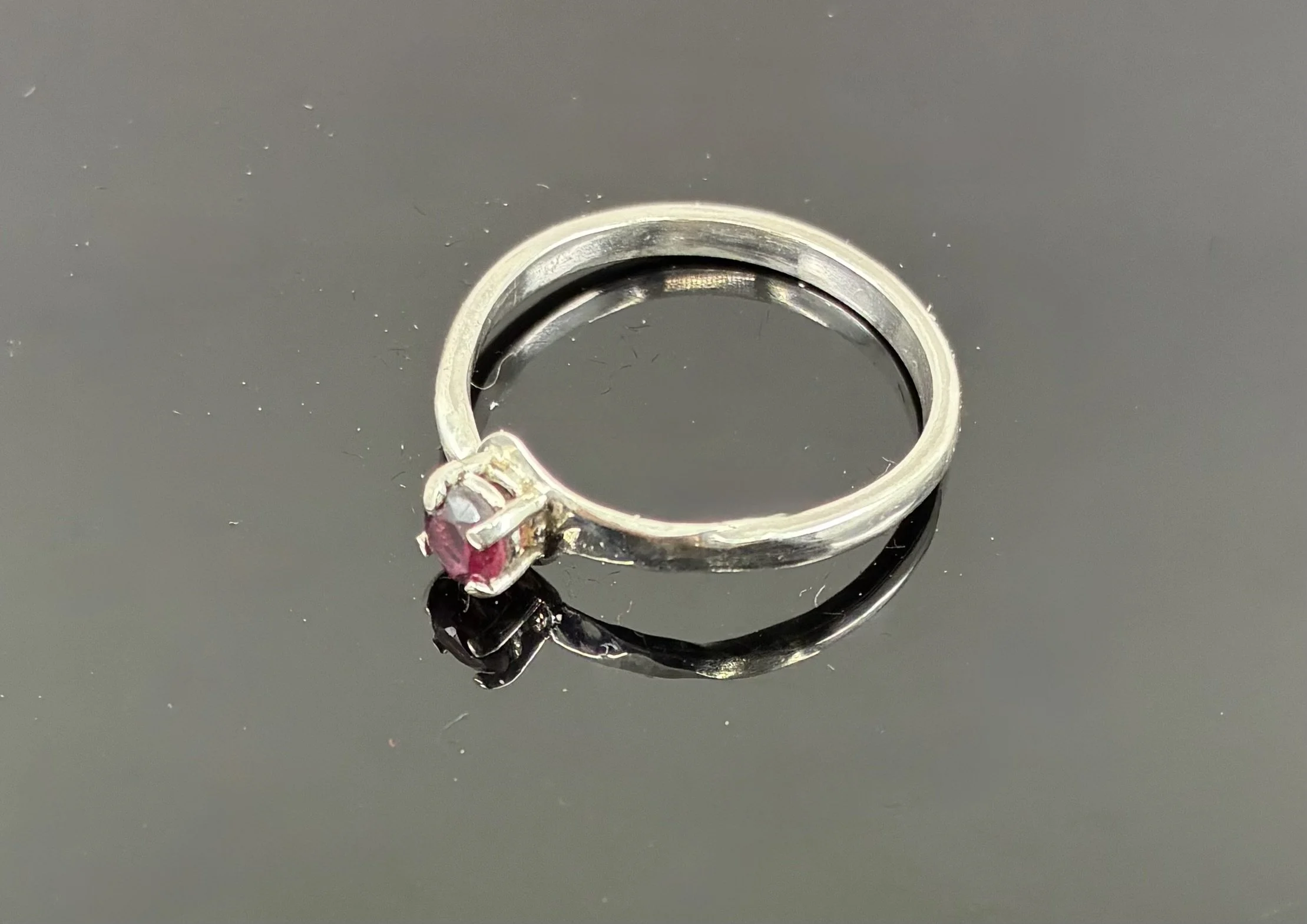 (42) Sterling Silver and Garnet Ring