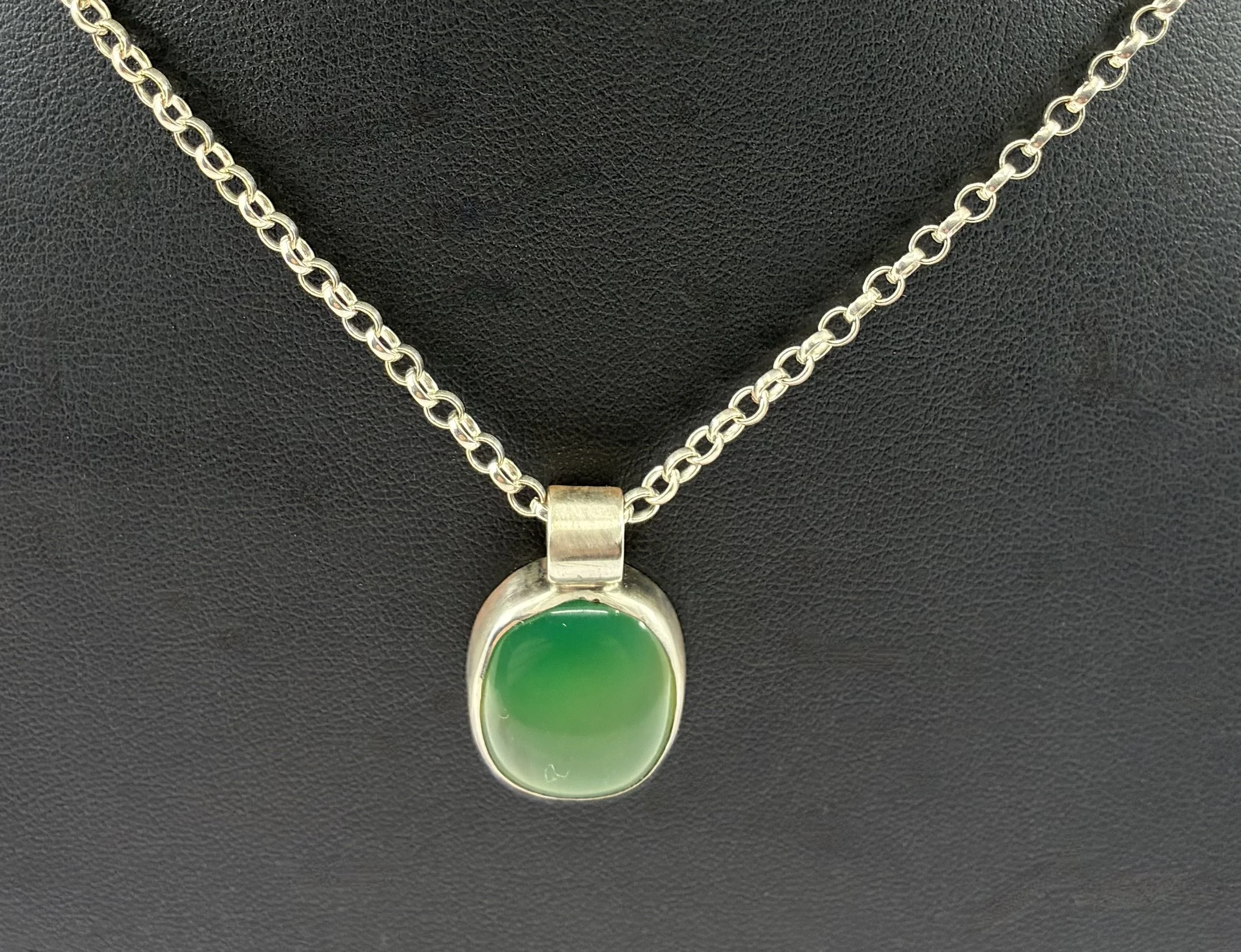 (6) Sterling Silver and Emerald Pendant
