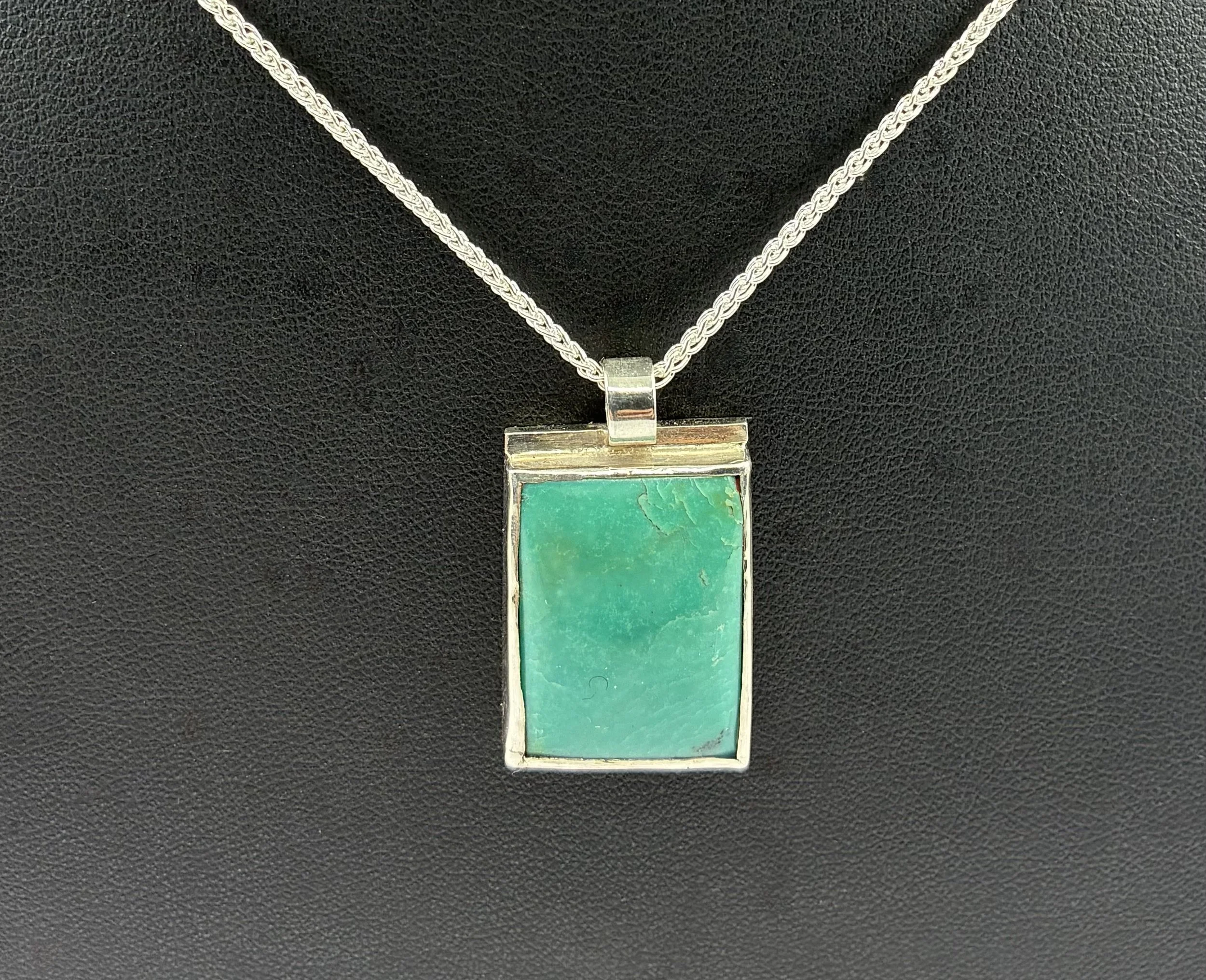 (29) Sterling Silver and Turquoise Pendant