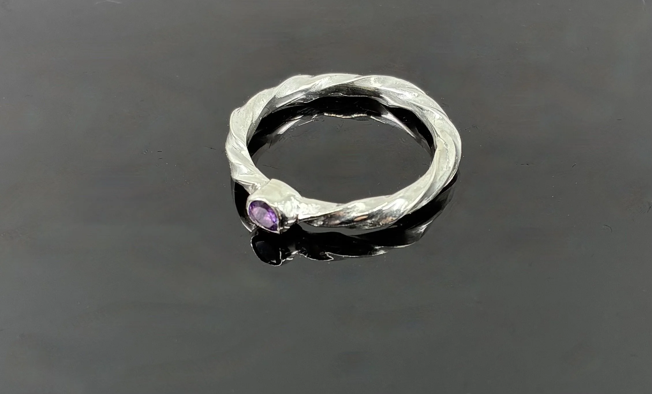 (28) Sterling Silver and Tanzanite Ring