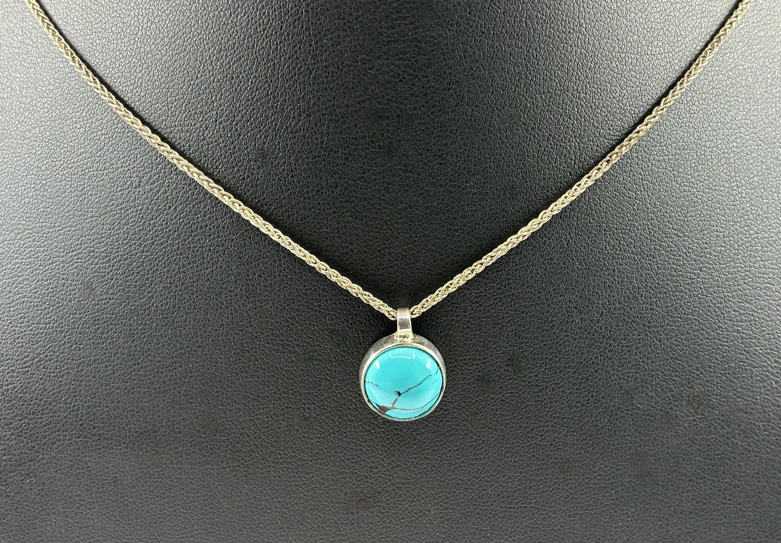 (18) Sterling Silver and Turquoise Pendant