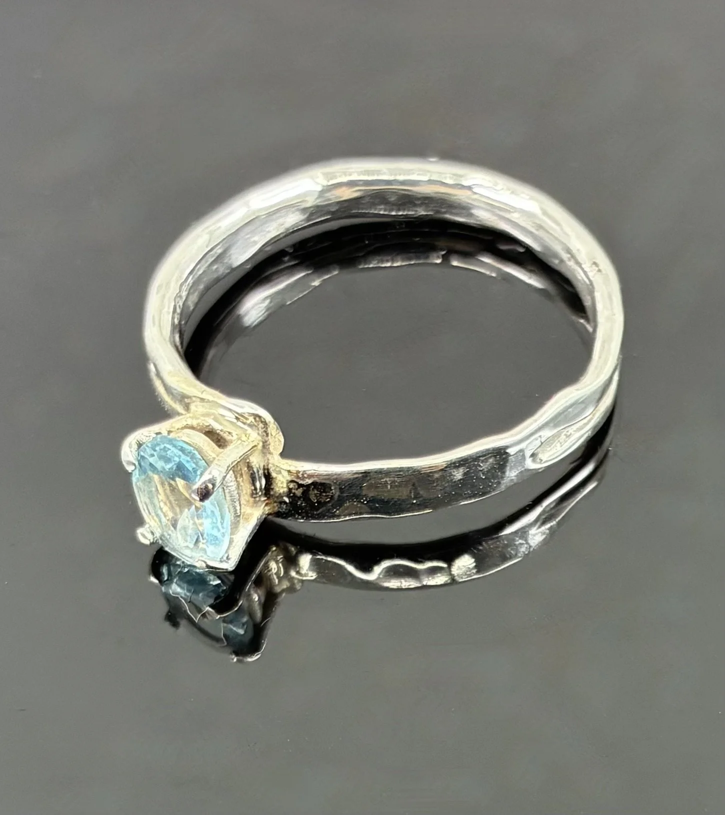 (75) Sterling Silver and London Blue Topaz Ring