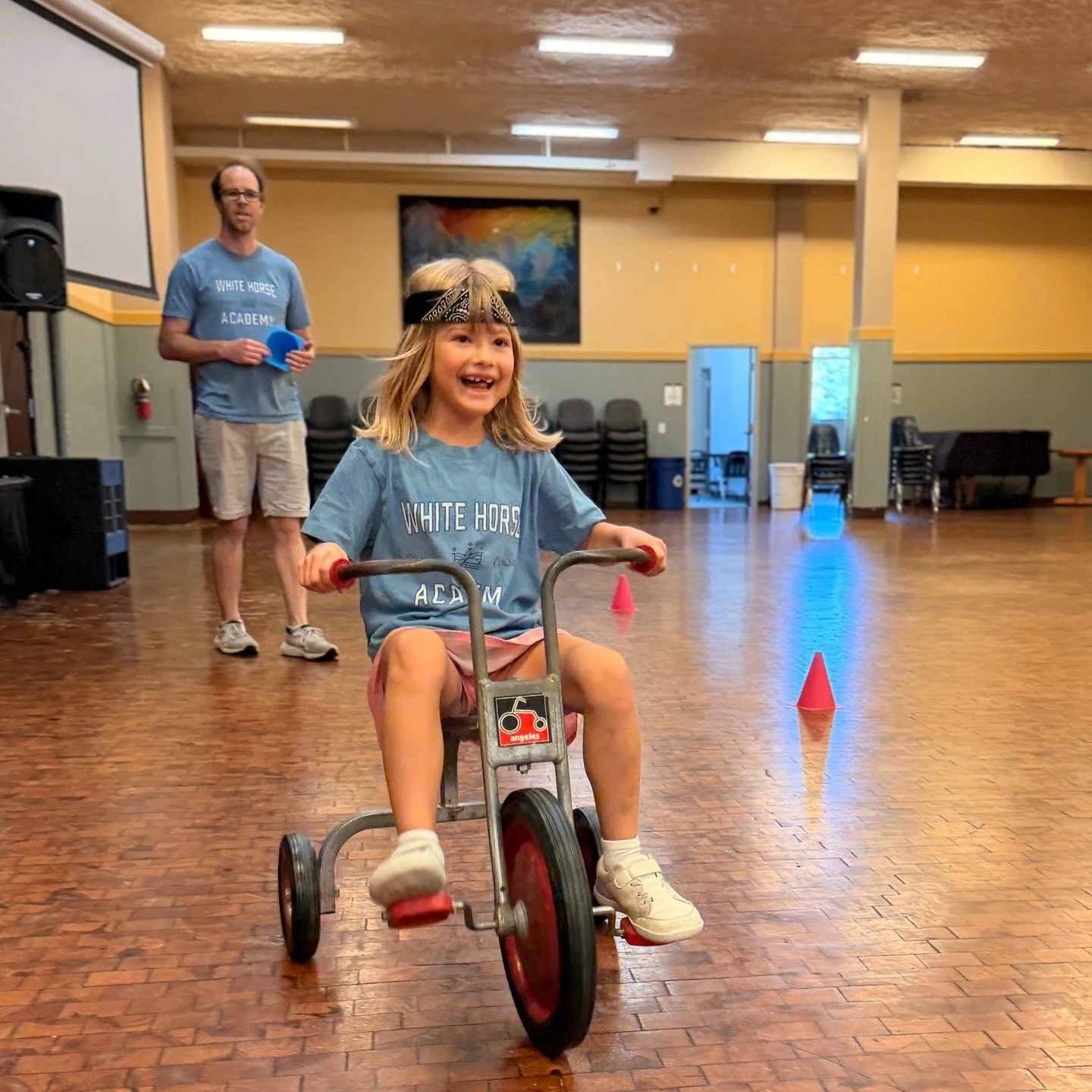 🎉 White Horse Academy&rsquo;s first Spirit Day of 2025 was a triumph of joy and competition, as Team Saxons took on Team Vikings! Our students tore across the field in sack races, sped through tricycle showdowns, balanced eggs on spoons with fierce 