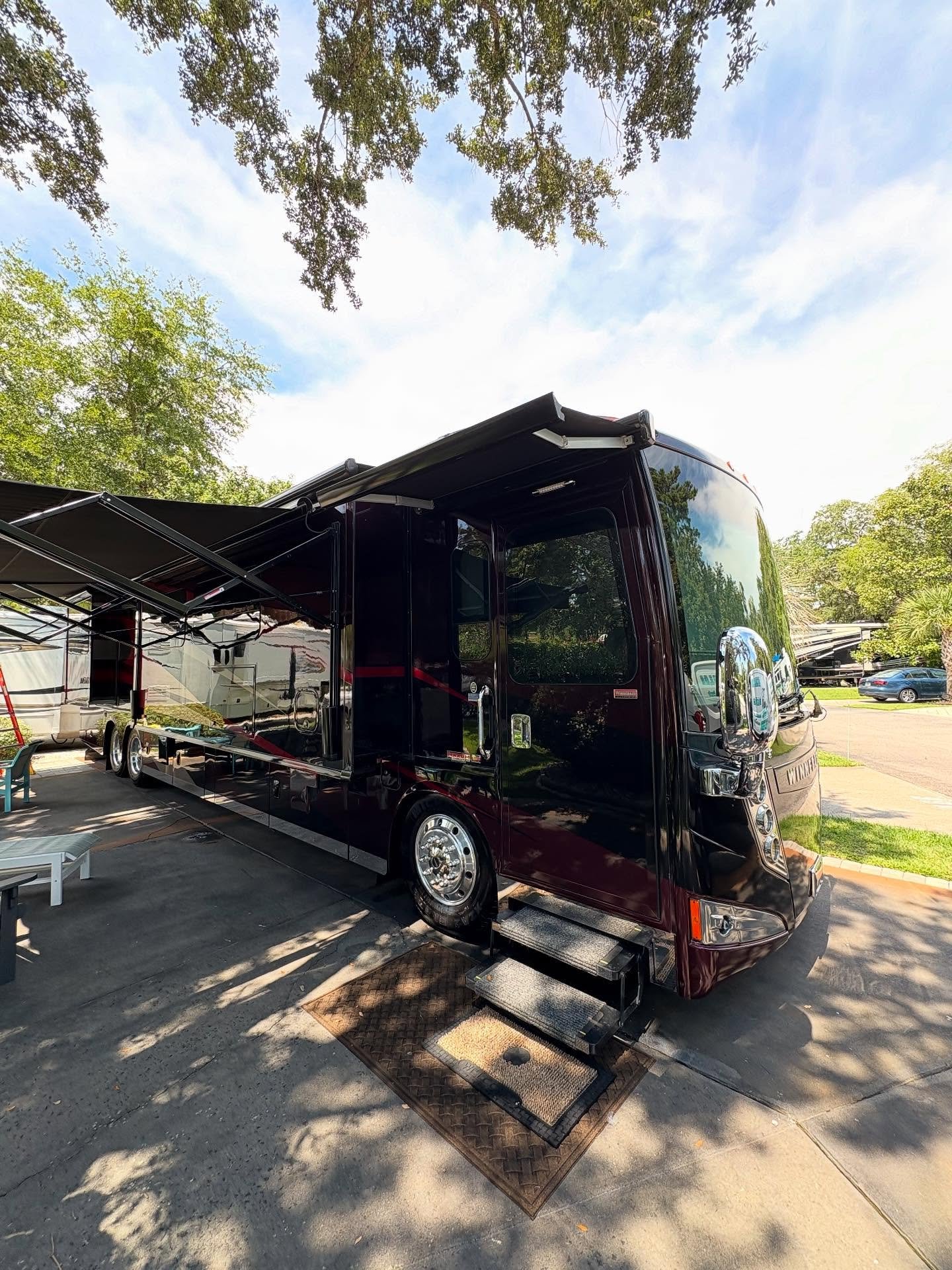 Black luxury motorhome parked in a lot Detailed in Beaufort, Bluffton and Hilton Head Island