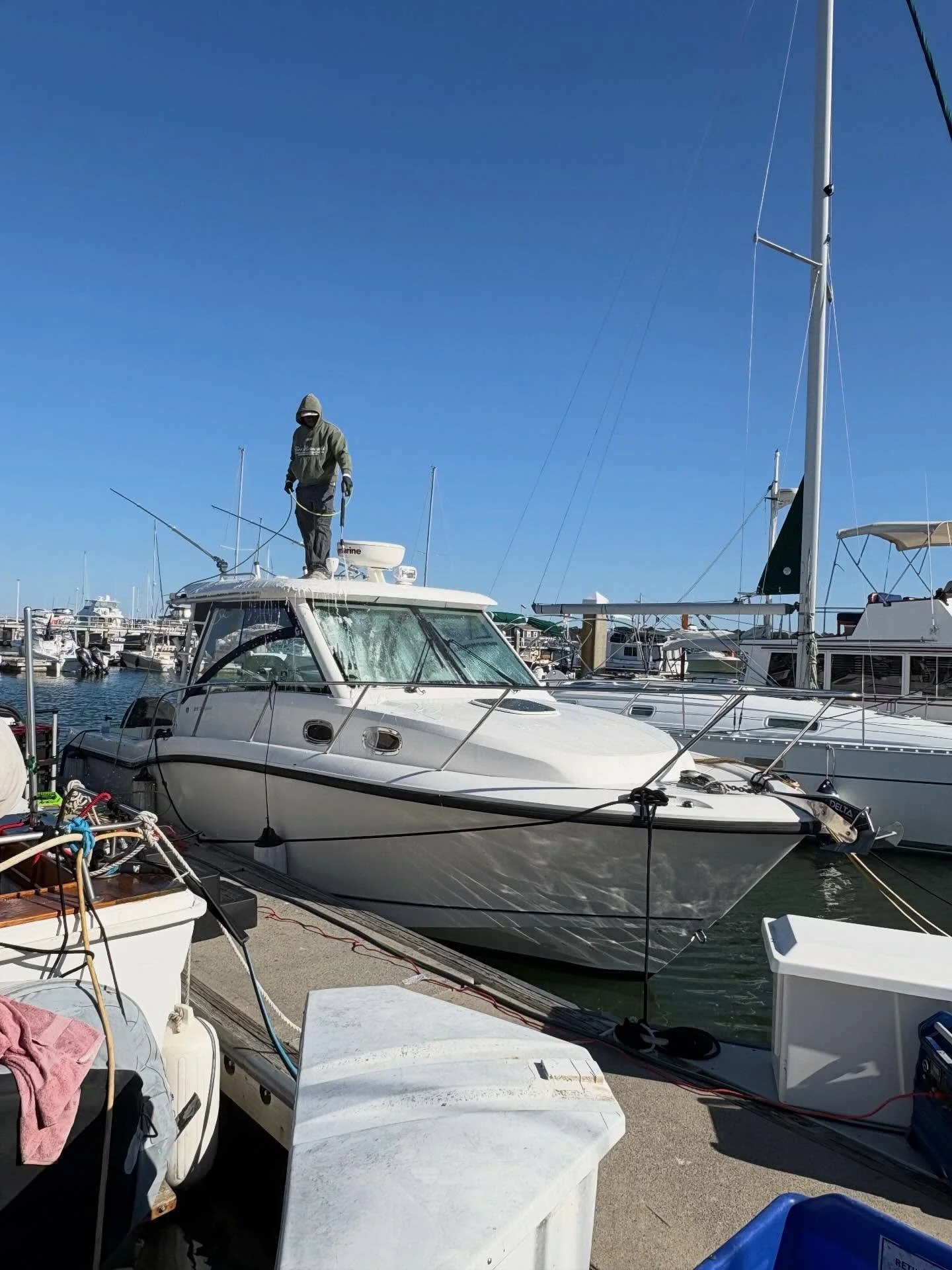 Boat Exterior wash at a dock in a marina
