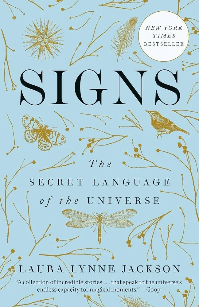 Blue Cover of SIGNS: The Secret Language of the Universe by Laura Lynn Jackson
