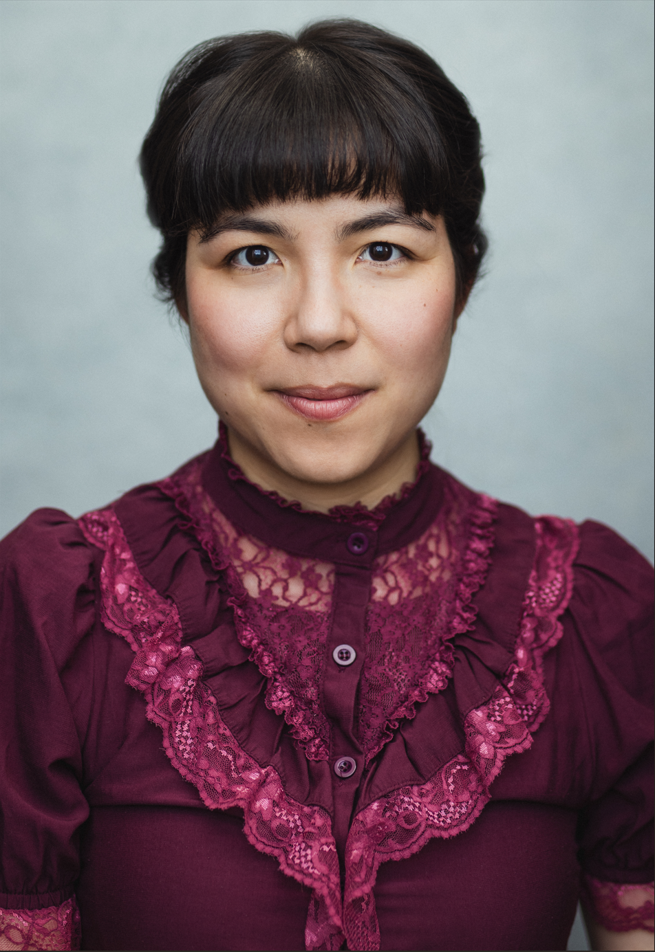 Headshot in burgundy Victorian blouse by Joss Ryder