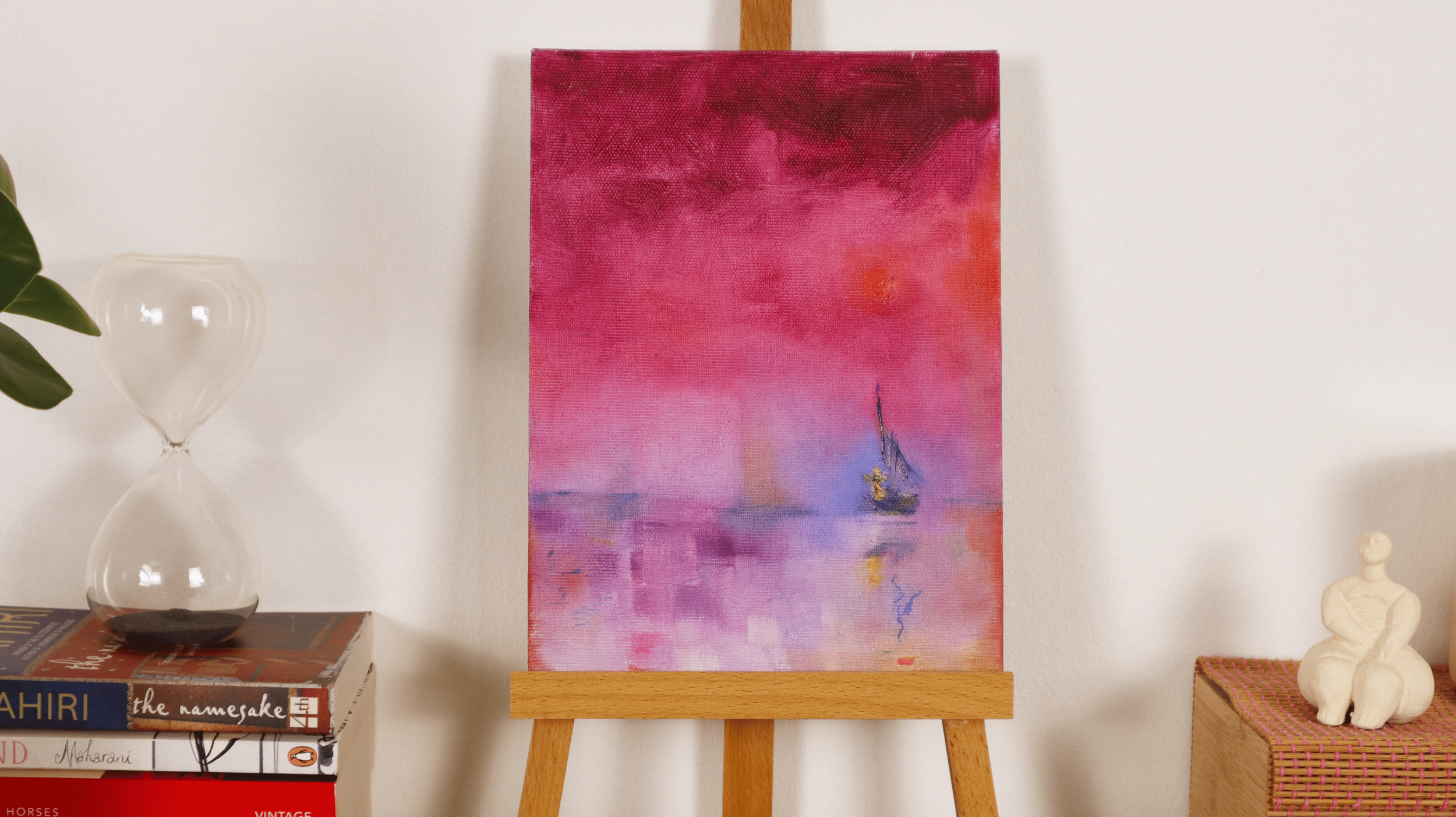 Pink violet abstract oil painting displayed in a modern minimalist interior
