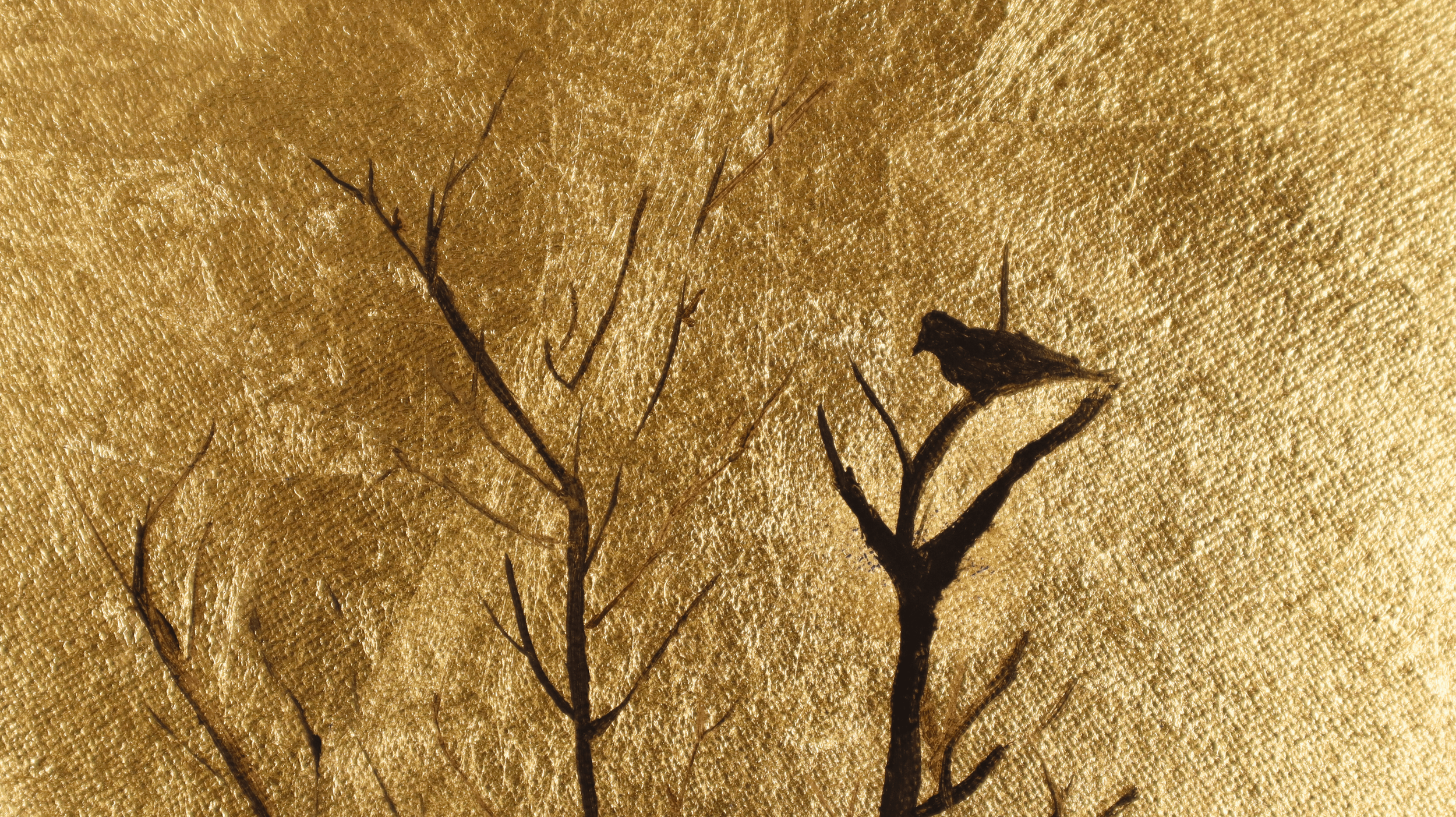 Detail of genuine gold leaf surface with black oil-painted branches