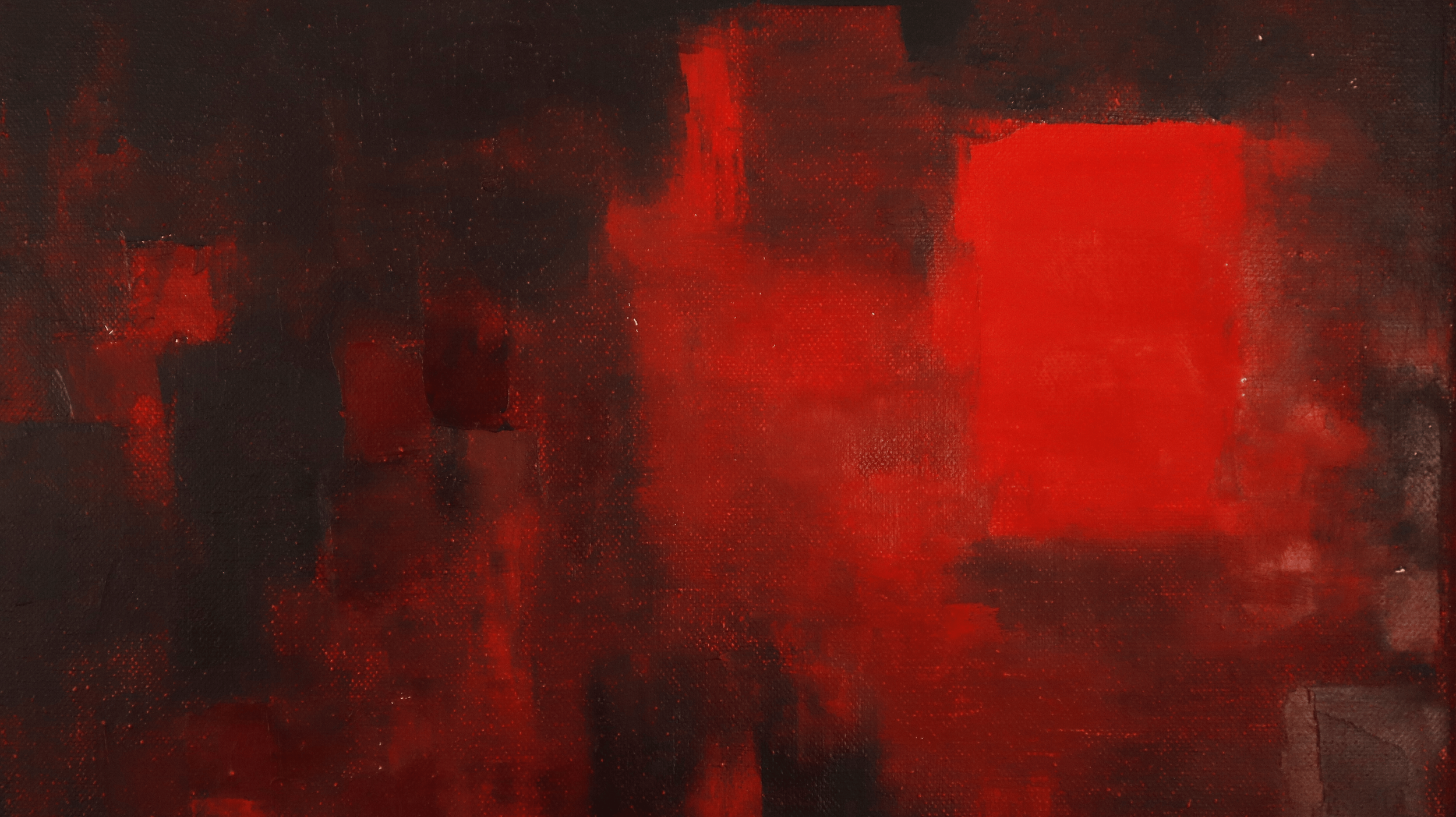 Detail of red abstract oil painting showing intense red element