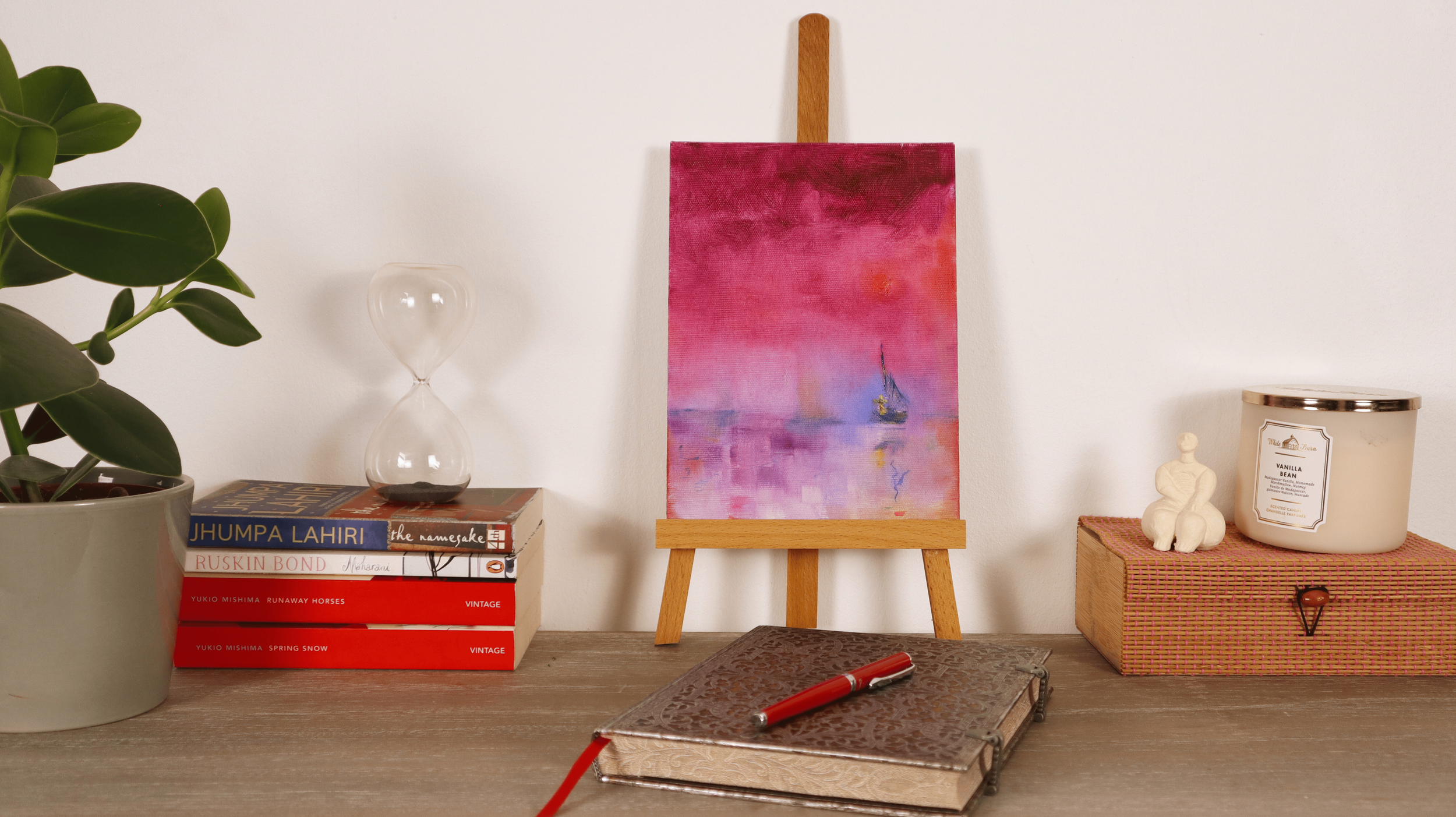 Pink violet abstract oil painting displayed in a calm modern interior
