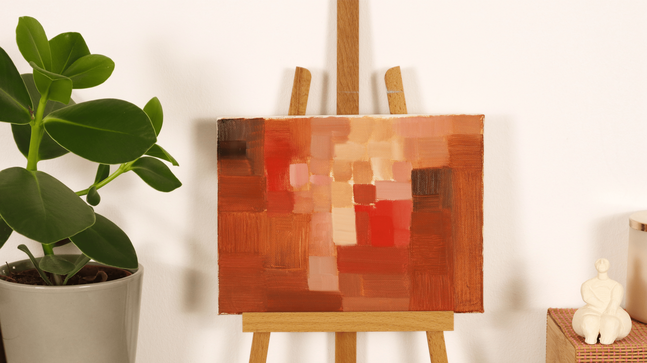 Original abstract oil painting featuring squares in shades of brown, orange, terracotta, and cream in modern environment