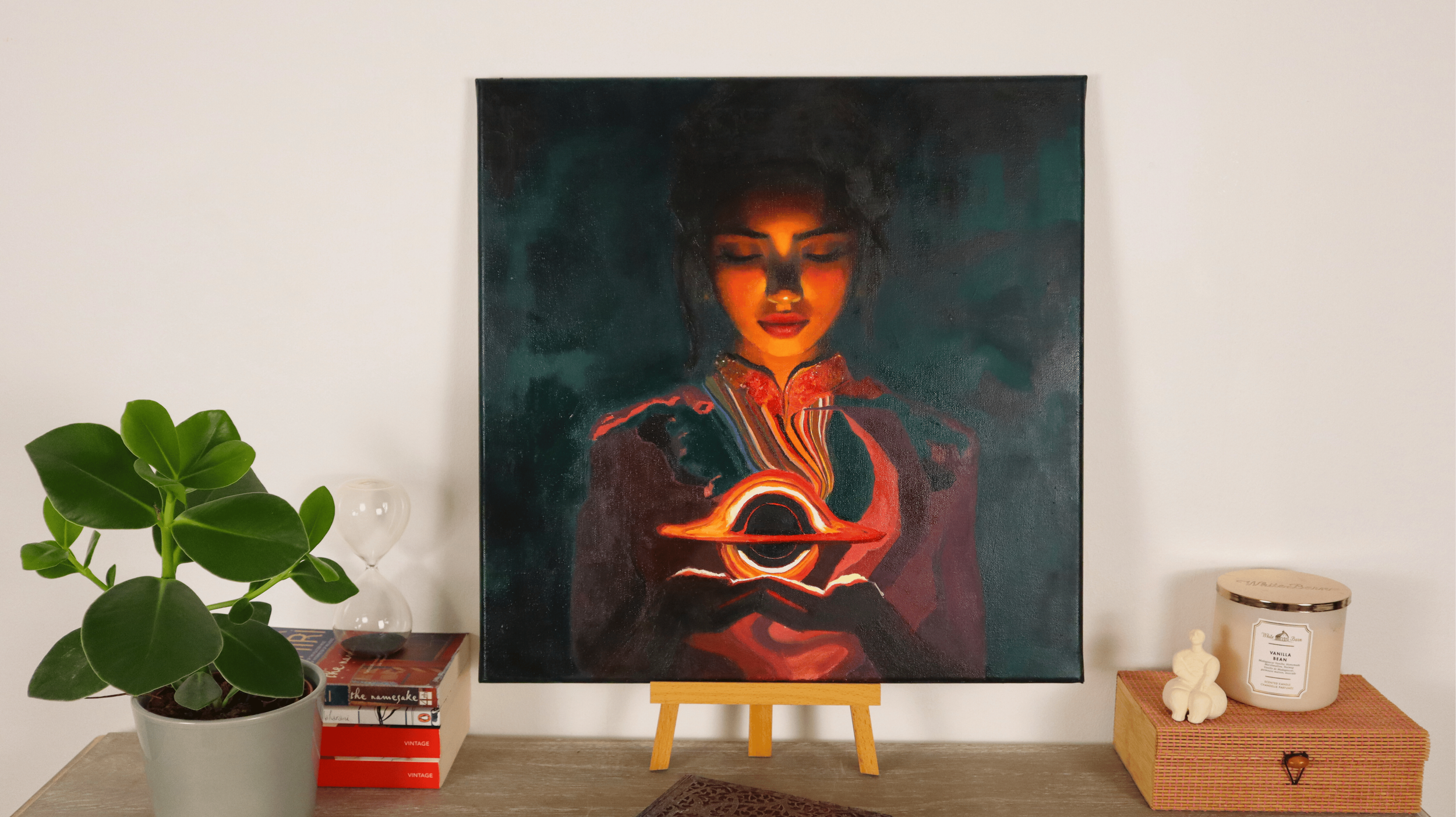 “At the Edge of Spacetime” figurative painting displayed in a modern interior, depicting a woman with a luminous black hole at her center.