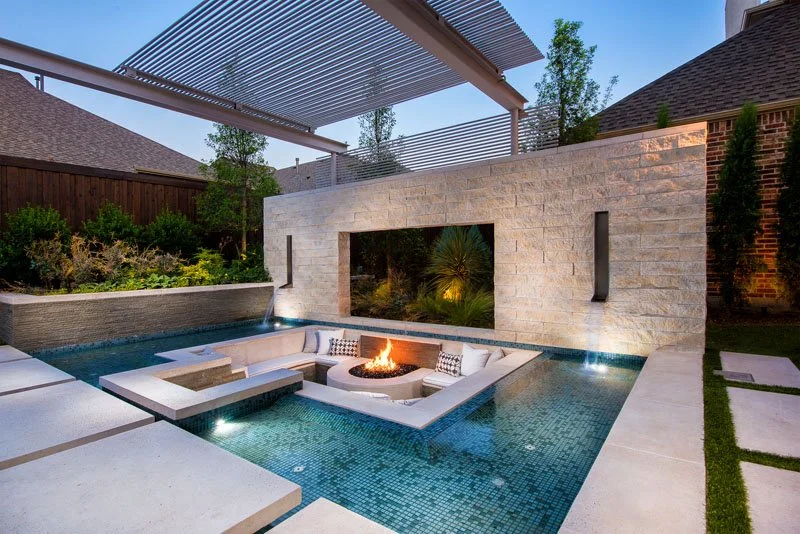 Sunken conversation lounge set into a pool deck