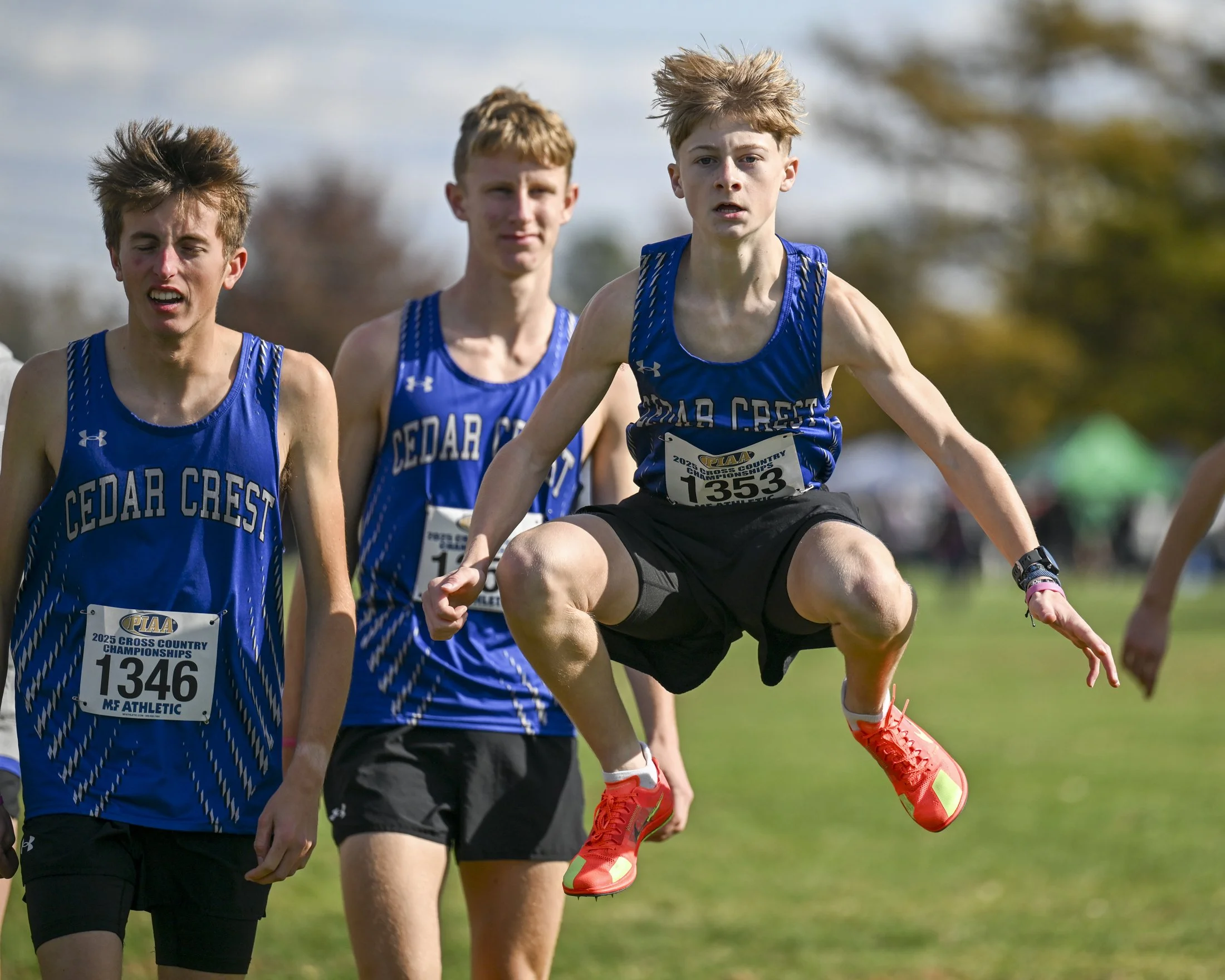 Cedar Crest High School boys warm up before the start of the AAA race at the PIAA Cross Country Championship.