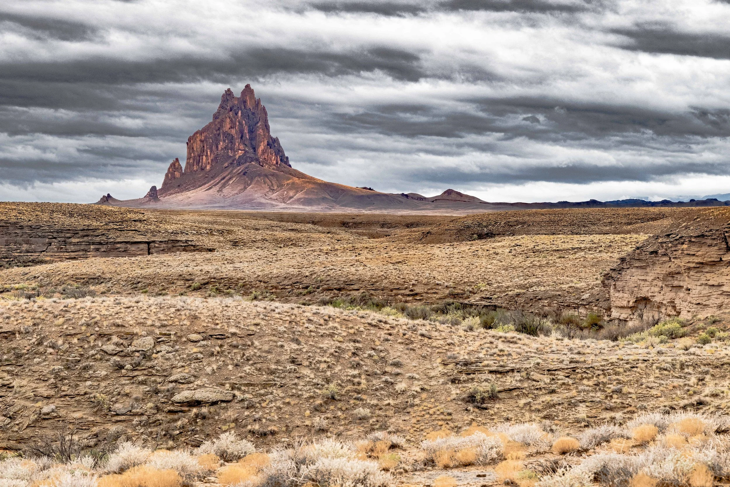 Shiprock image taken from Rte 64 with low-hanging storm clouds