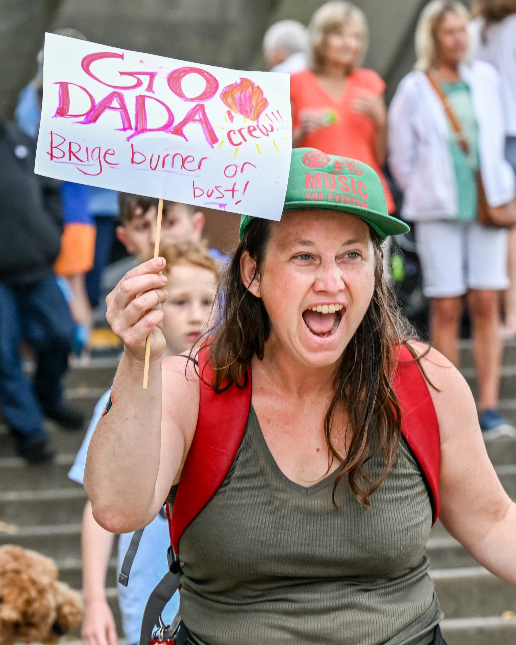 Karen Smith of Wrightsville cheering competitors at Riverfest.