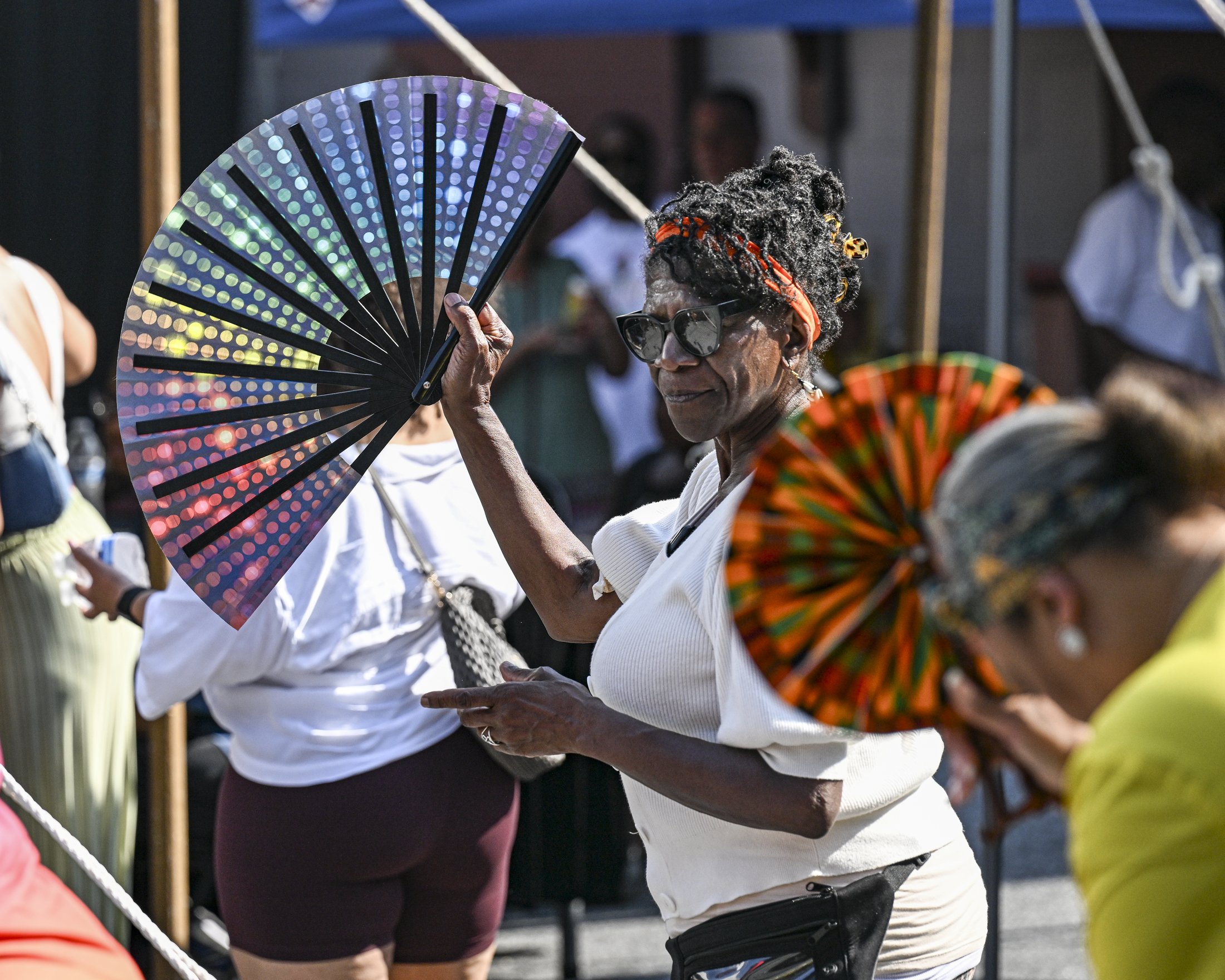 Attendees dance while celebrating Juneteenth and the Negro League Lancaster Centennial at the Crispus Attucks Community Center.