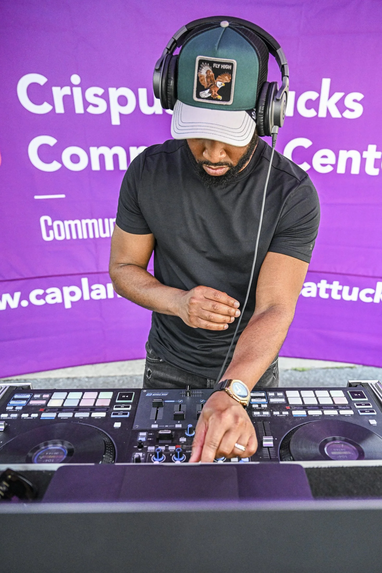 DJ ClubKng of Harrisburg performs at the Juneteenth mixer.