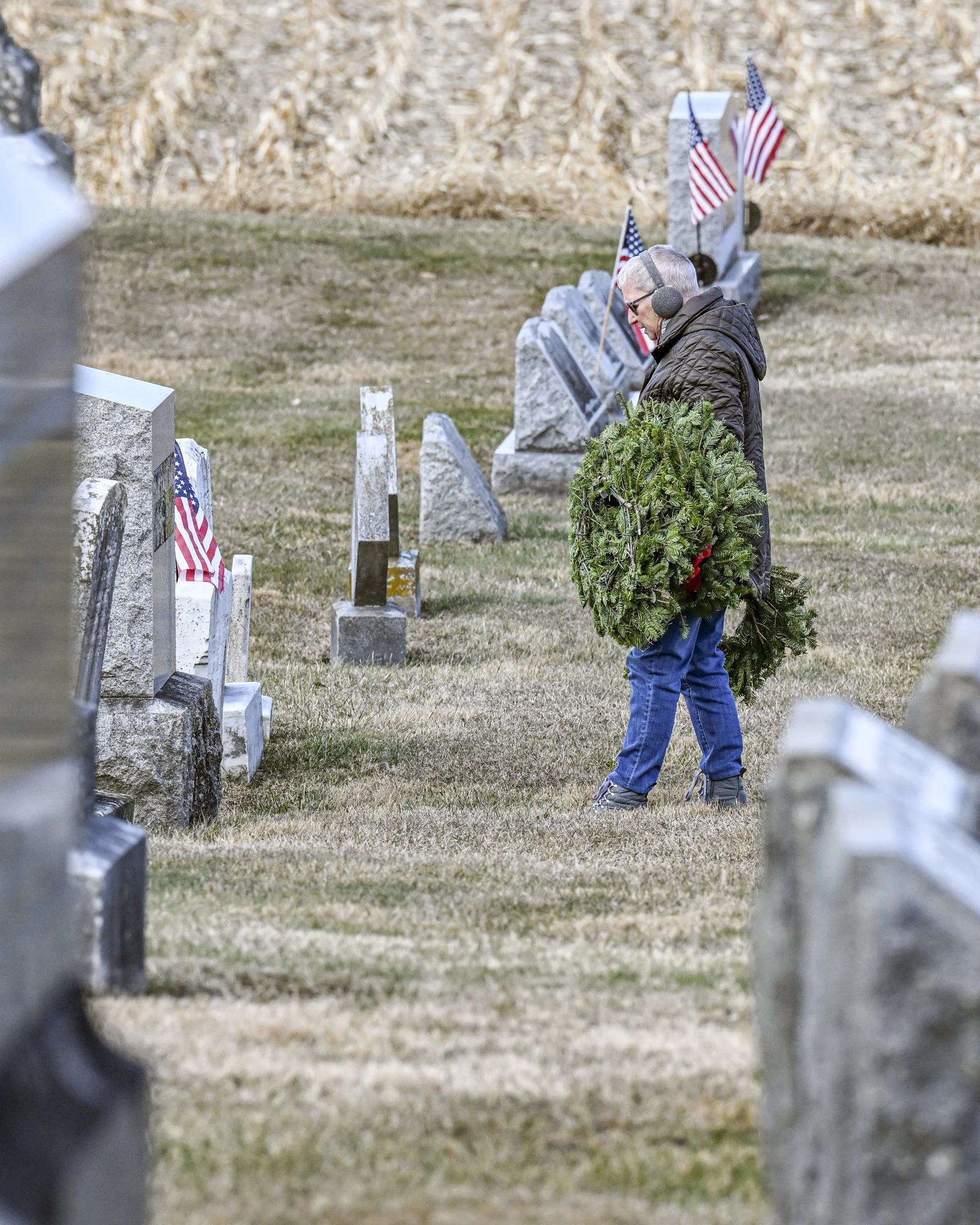 Paula Sigel of Strasburg, PA pays her respects to a veteran at Bellevue Presbyterian Church.