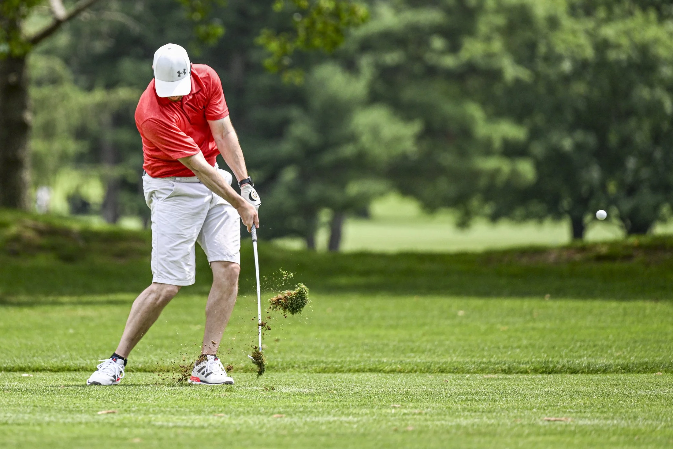 Corey Wenger strikes the ball on the fairway at the Lancaster Amateur golf tournament on Sunday, Jun. 22, 2025.