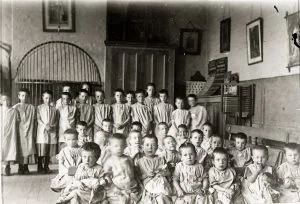 "And the workhouses? Are they still in operation?"
By the 1830’s the majority of parishes had at least one workhouse. Poor Laws dictated that to receive aid, people had to work. 
The conditions were harsh and treatment was cruel with families divided