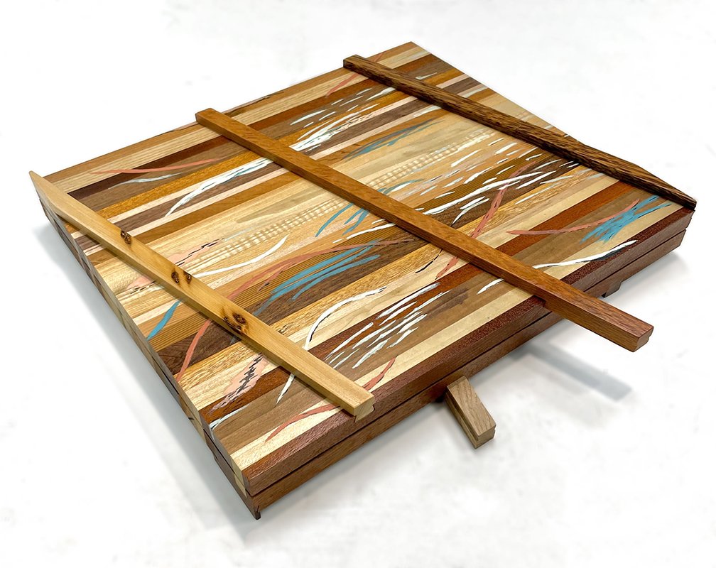 Document box for marriage certificate. Top and bottom cross pieces stabilize the box and act as handles