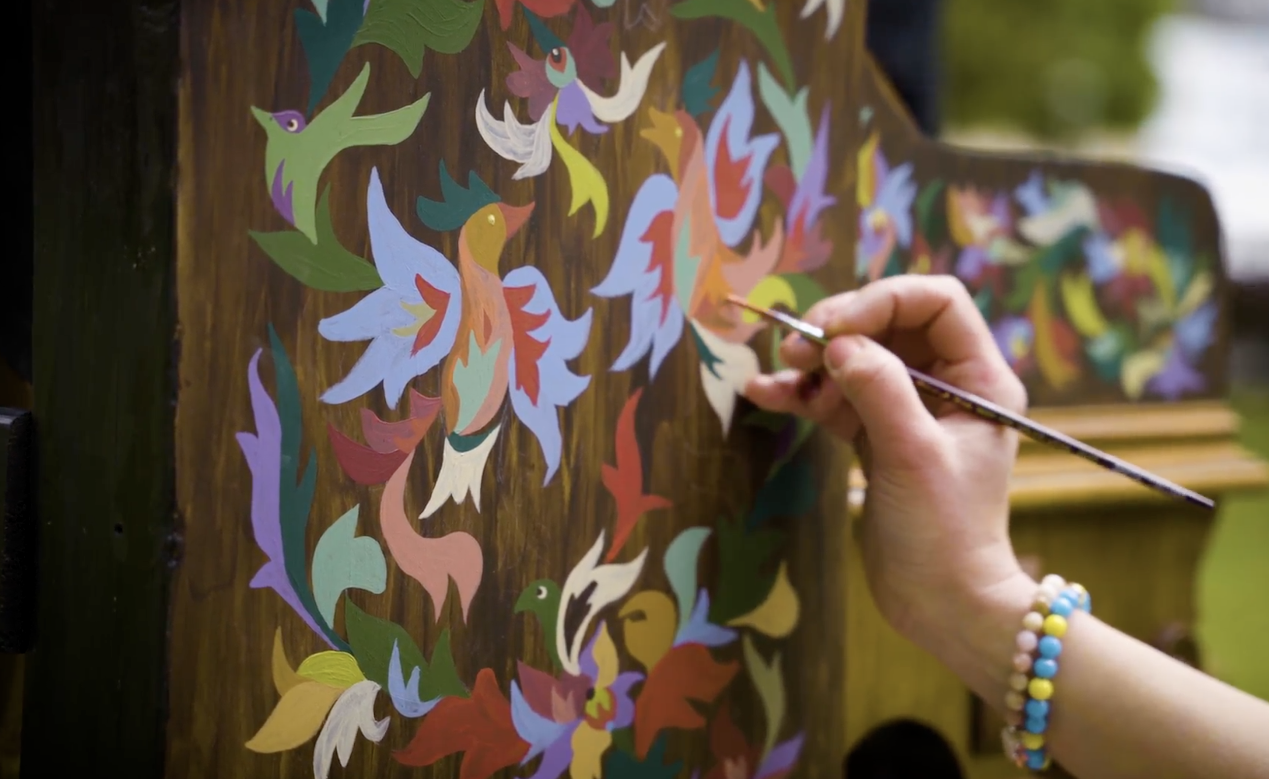 Hand-painted cultural mural in progress on the Piano of Tasmania