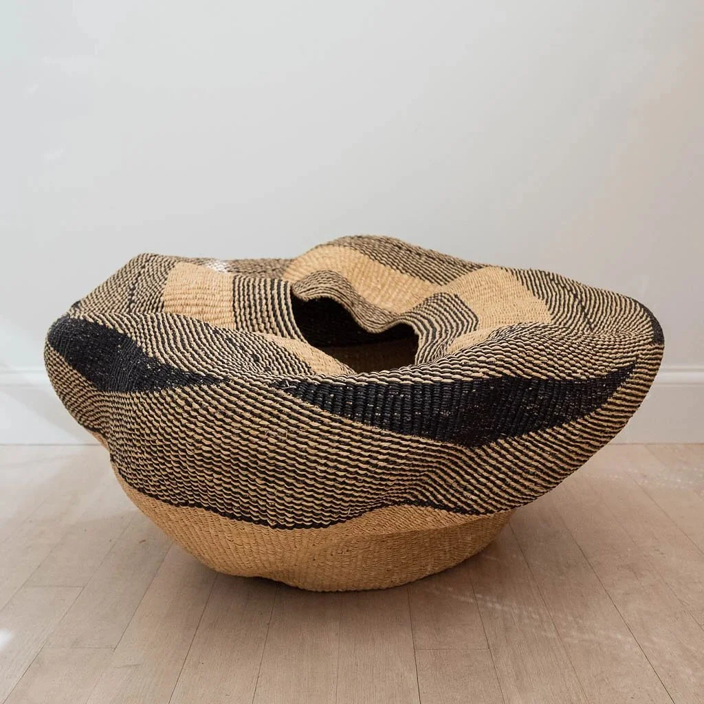 Meet the Ayeratukko Basket &ndash; a stunning, handwoven piece by @babatreebaskets, now available through Sanae Collective. Made with vibrant, natural elephant grass and dyed using traditional techniques, this basket is a tribute to the artistry of t